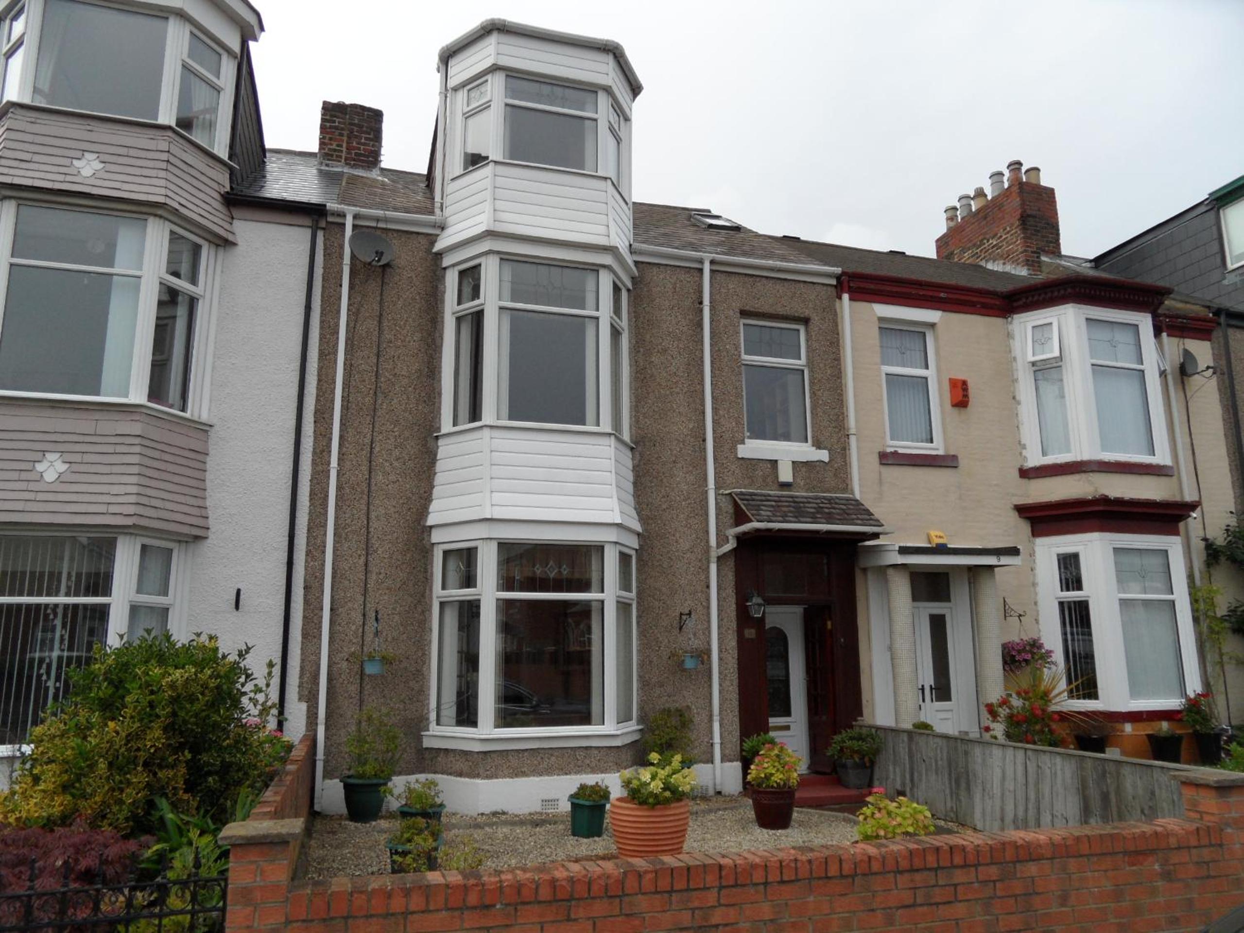 Three-Bedroom House - Photo 16