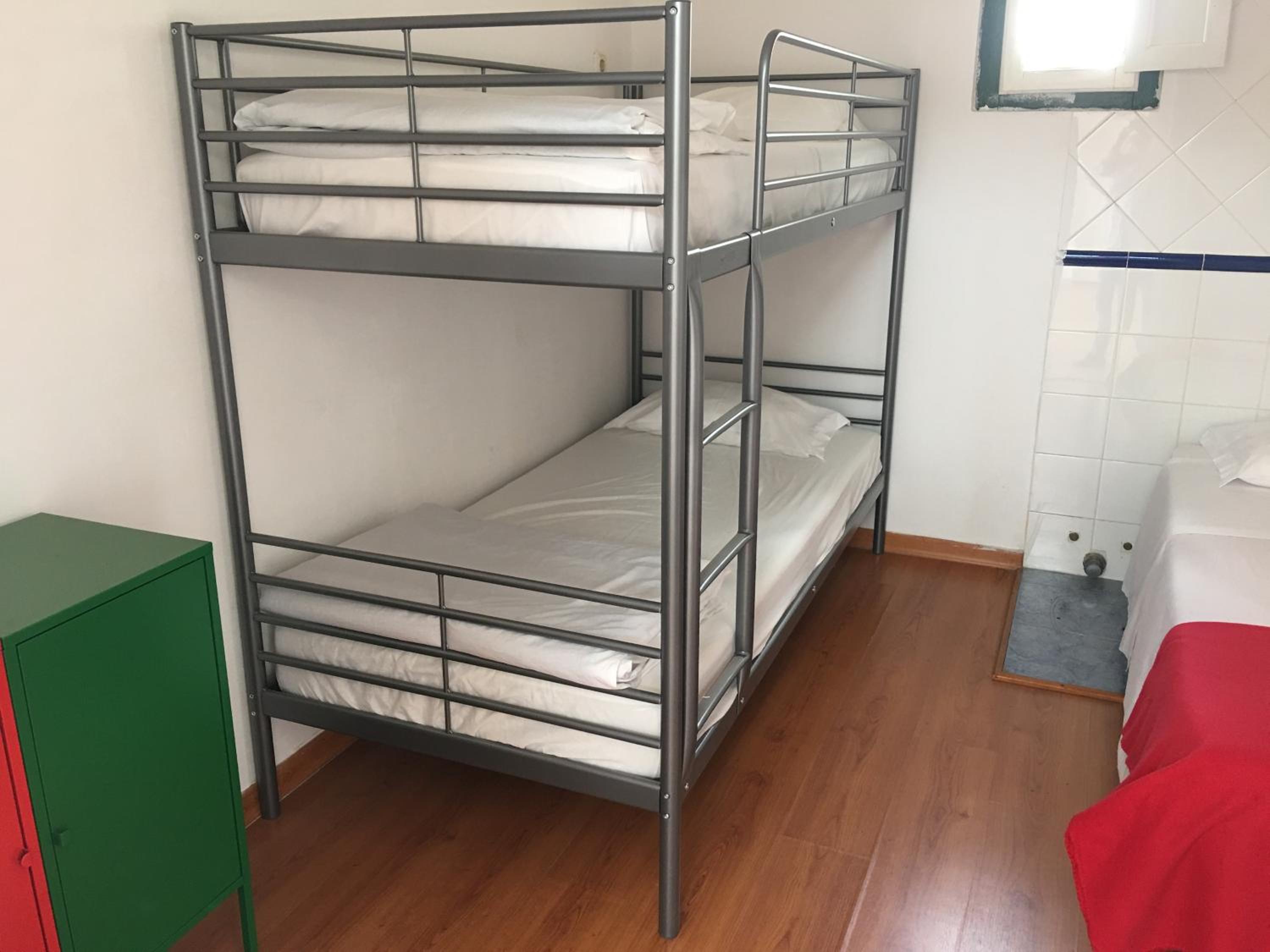 Single Bed In Male Dormitory Room photo 3