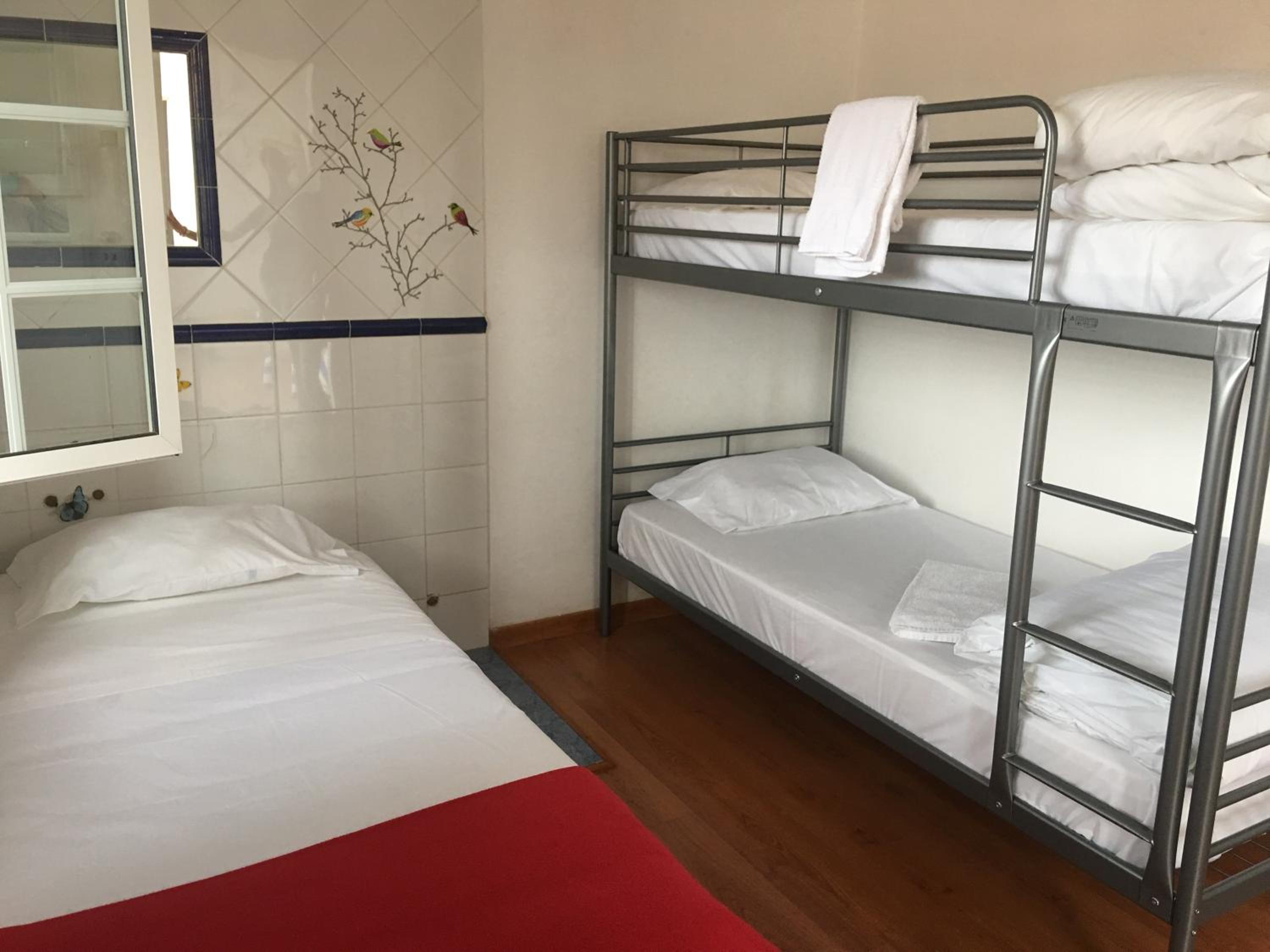 Single Bed In Female Dormitory Room photo 1