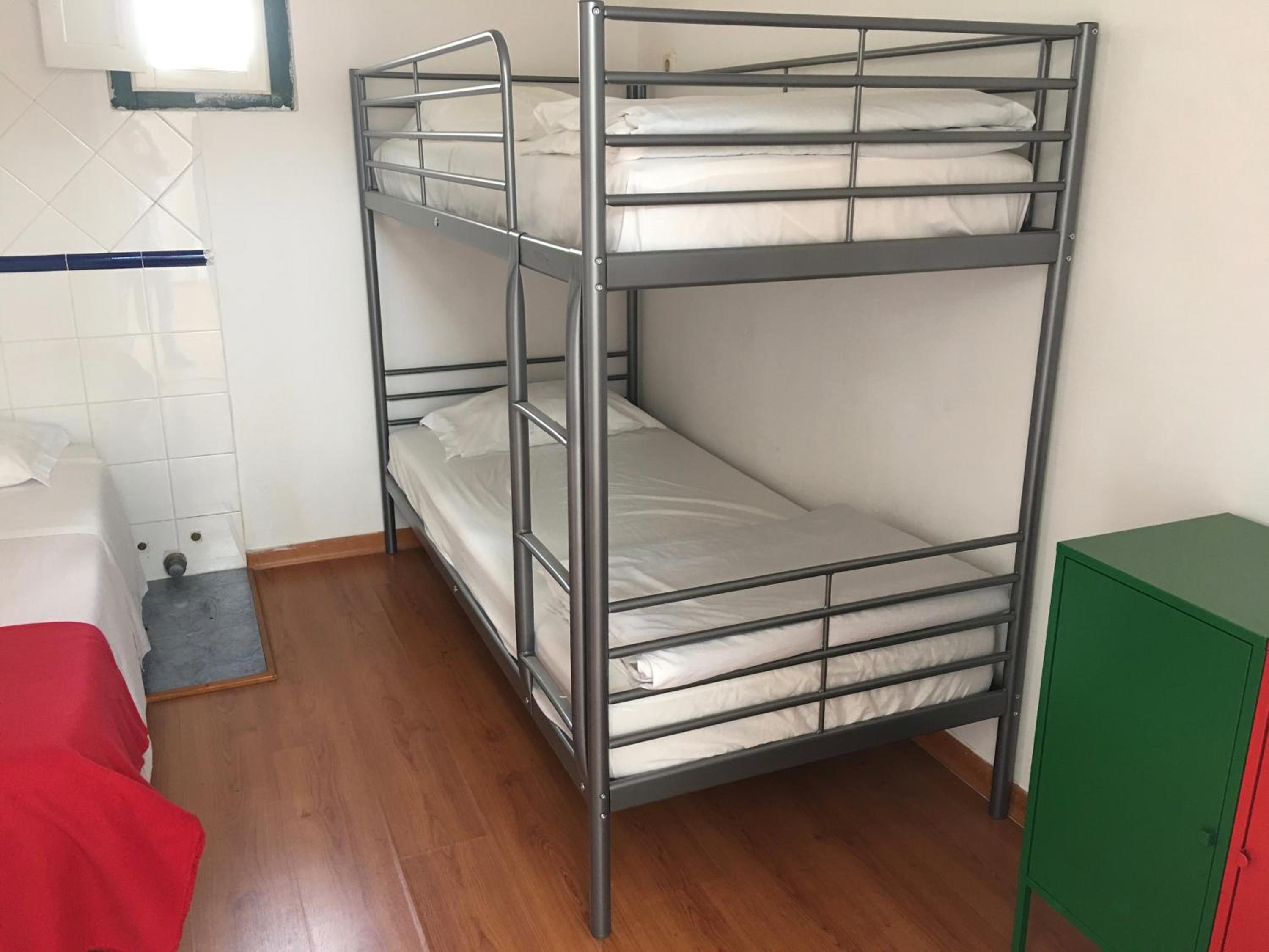 Single Bed In Male Dormitory Room photo 2