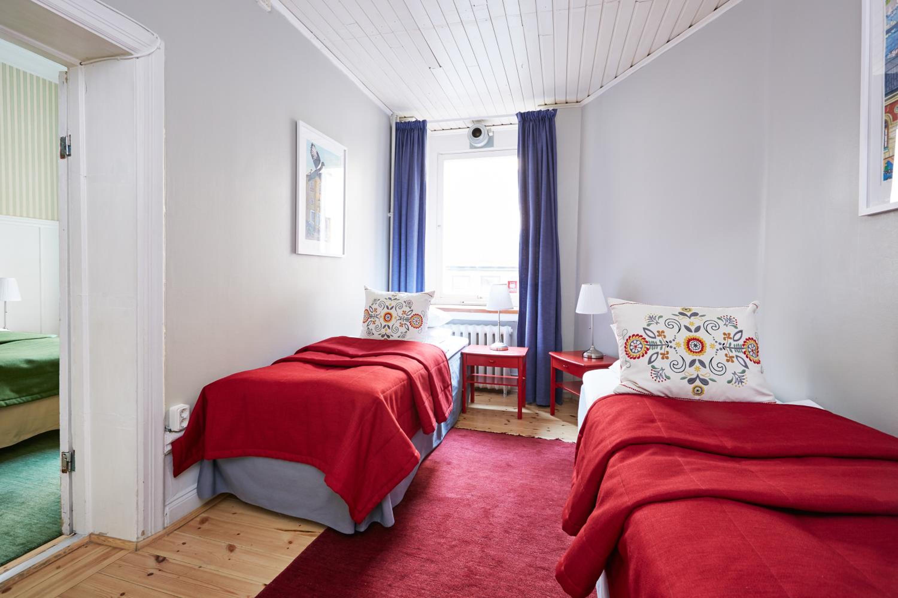 Quadruple Room with Private Bathroom - Photo 1