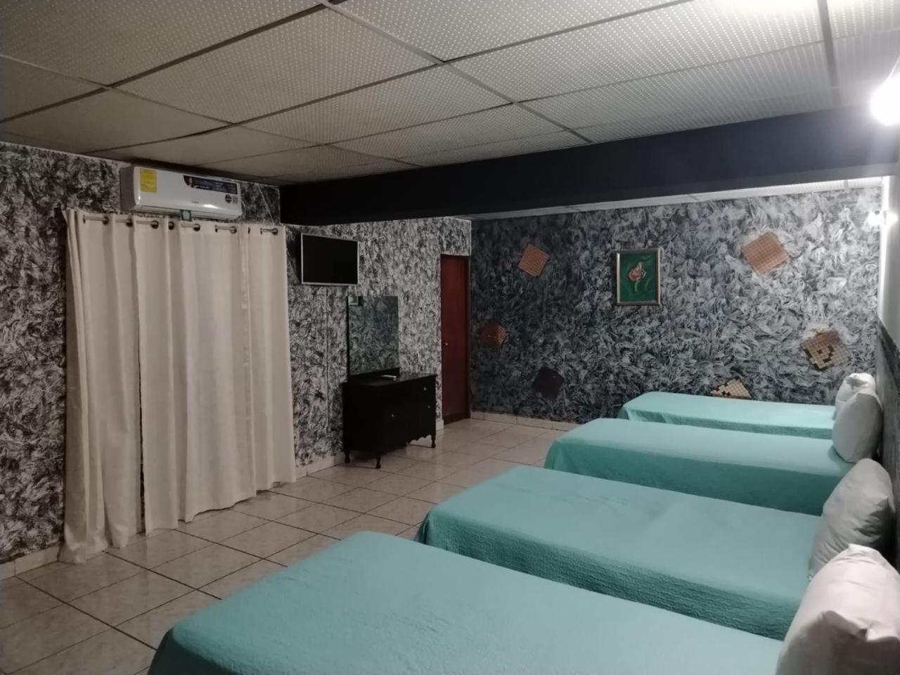 Quadruple Room with Private Bathroom