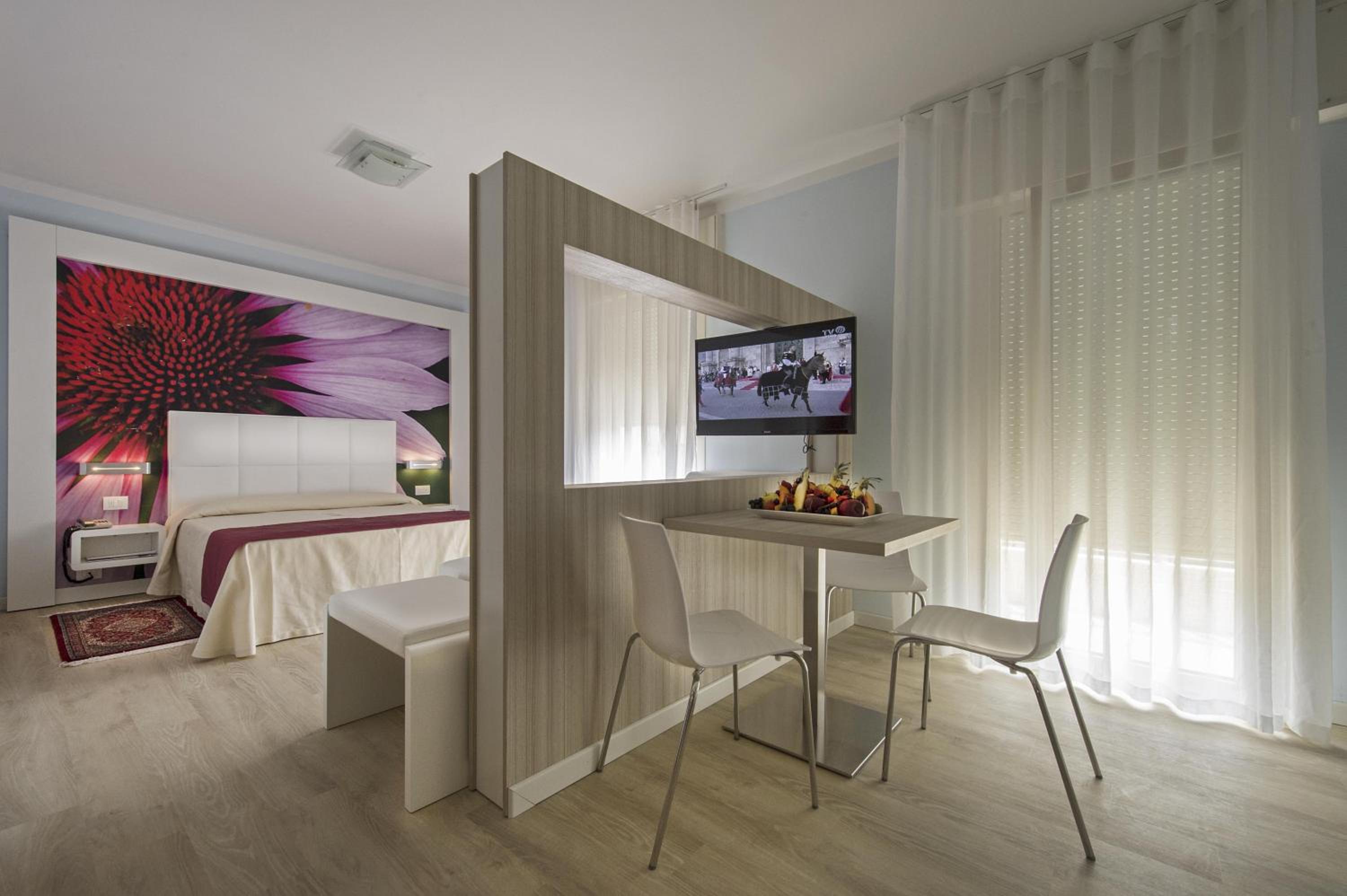 De Luxe Quadruple Room photo 1