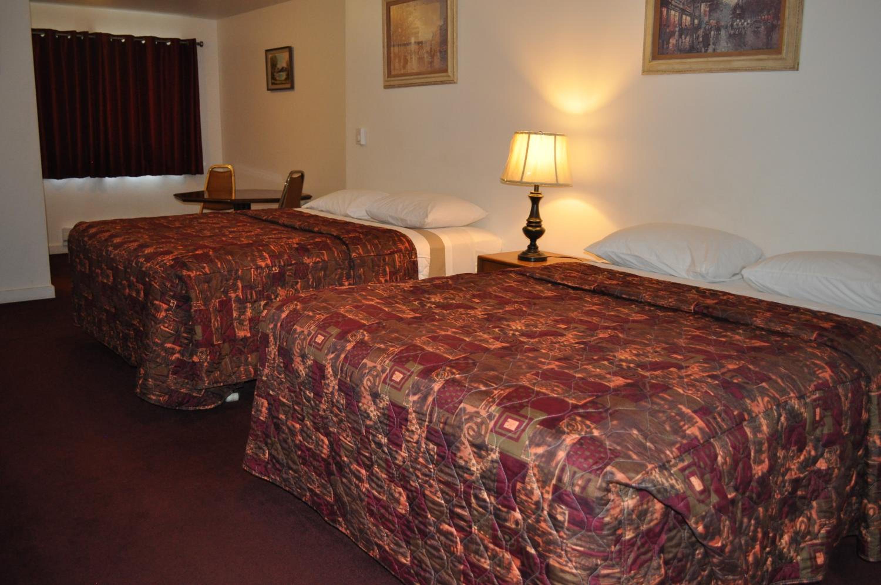 Deluxe Queen Room with Two Queen Beds photo 1