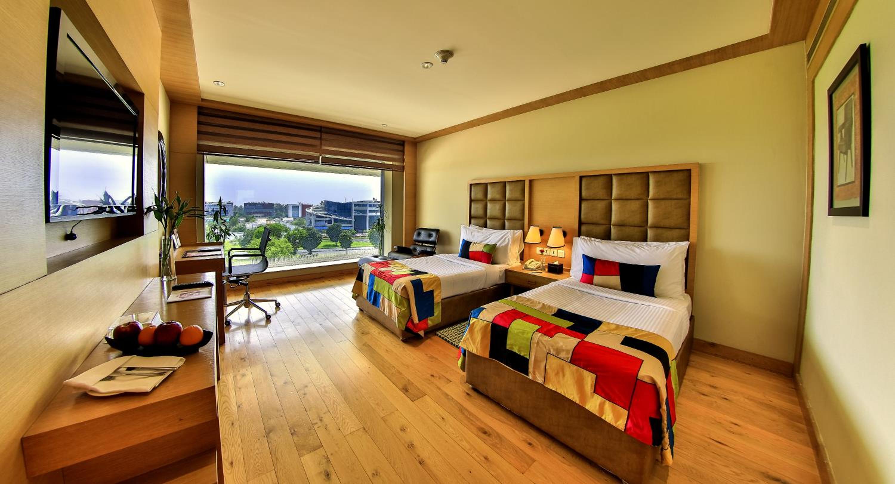 Deluxe Twin Room with 10% discount on F&SB, SPA & Laundry,Happy Hours deal offering 1+1 offer. Offer is available from 6:00 PM till 8:00 PM at The Circle Bar Deluxe Twin Room with 10% discount on F&SB, SPA & Laundry,Happy Hours deal offering 1+1 offer. Offer is available from 6:00 PM till 8:00 PM at The Circle Bar