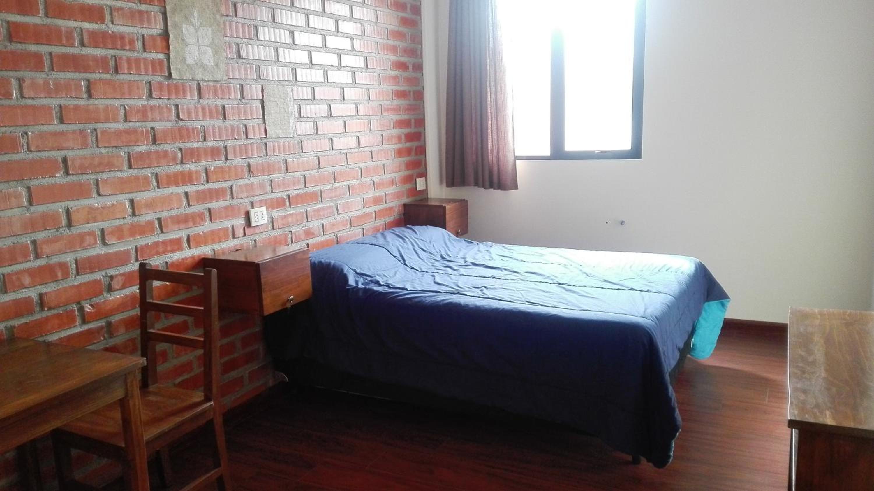 Queen Room with Shared Bathroom