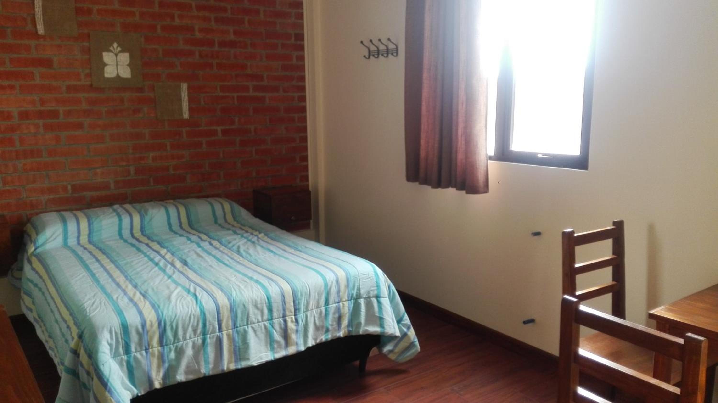Queen Room with Shared Bathroom photo 2