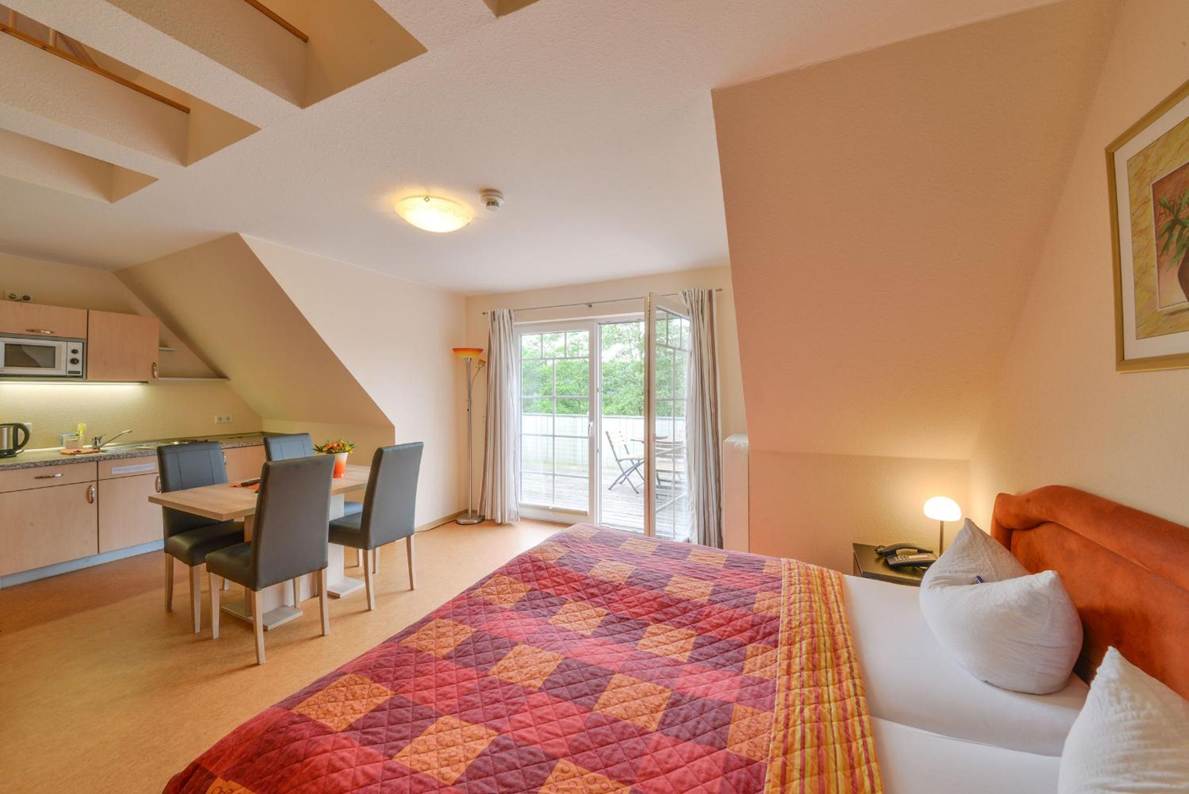 Family Room with Balcony and Kitchenette  photo 2