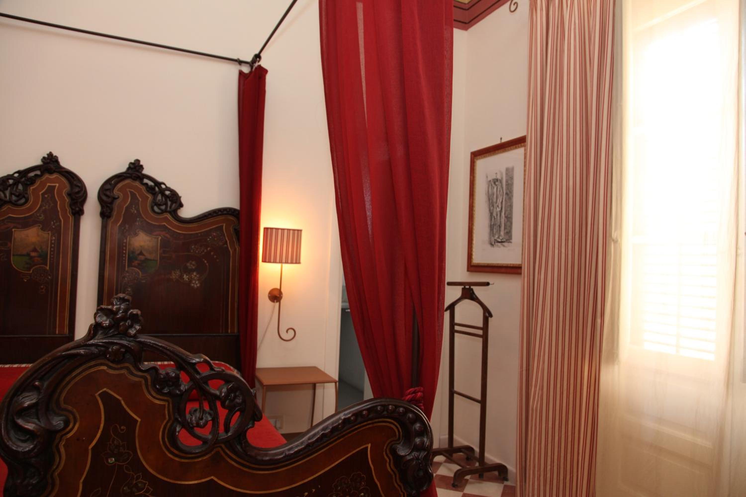 Deluxe Quadruple Room - Photo 6
