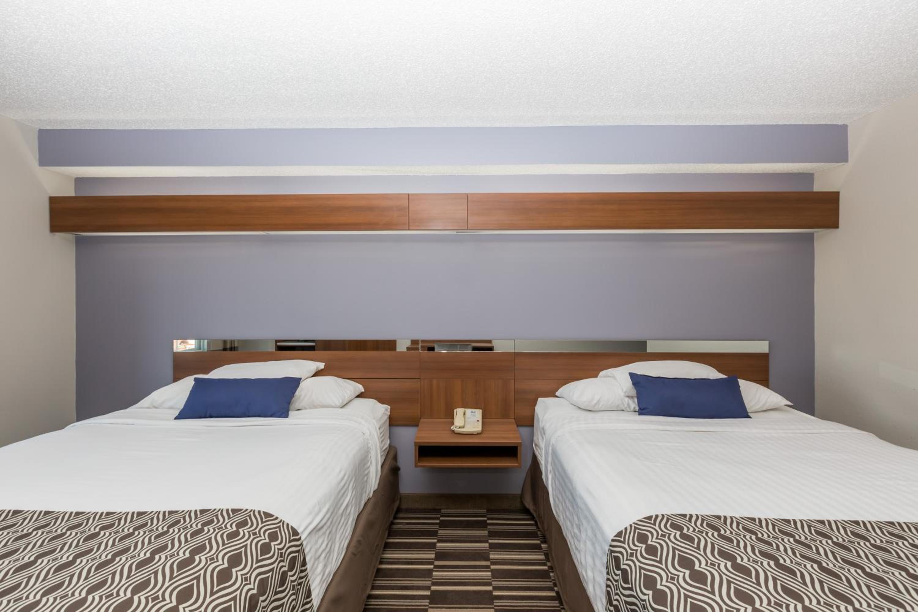 Queen Room with Two Queen Beds - Non-Smoking - Photo 1