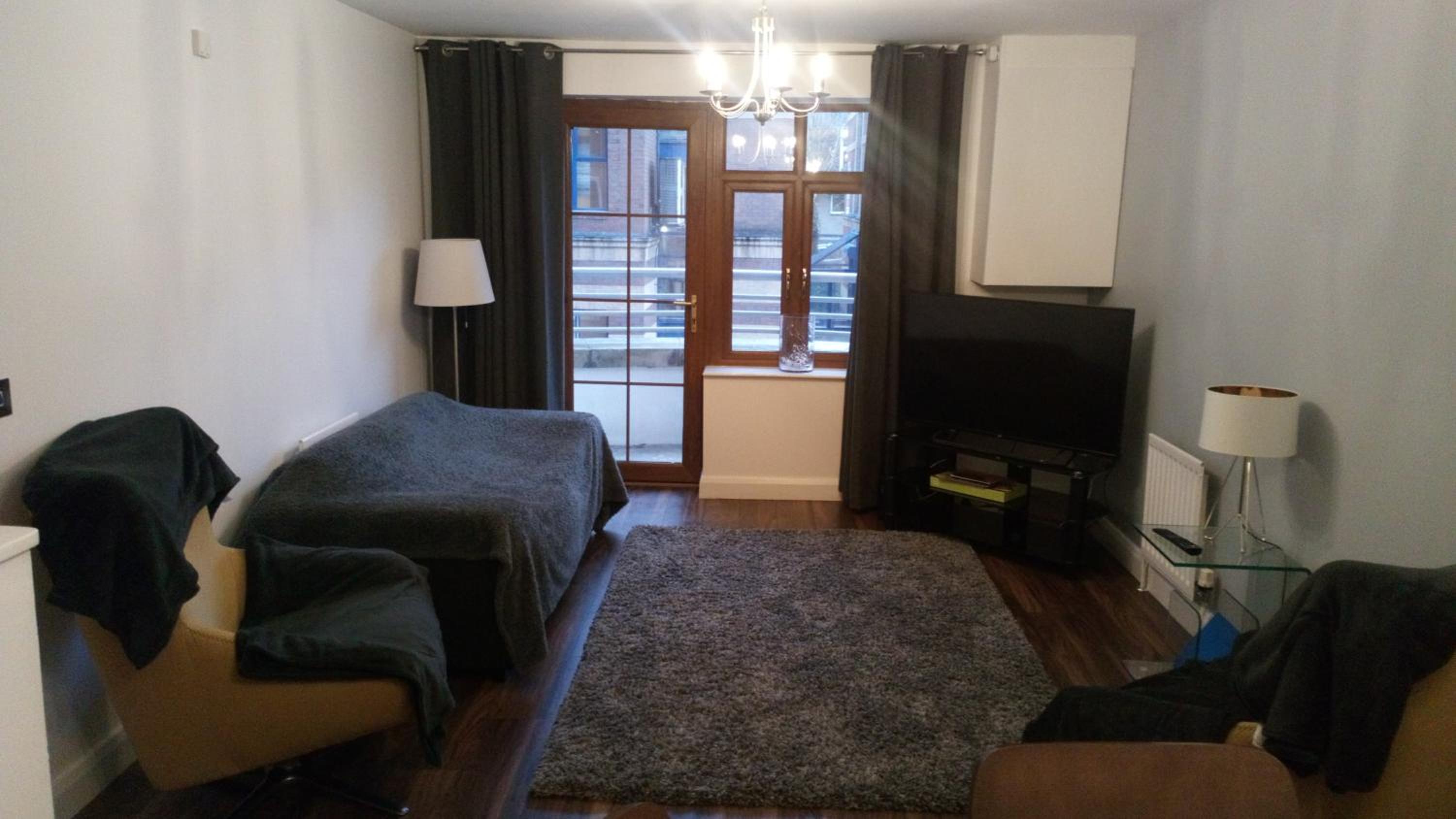 Apartment with Balcony - Photo 12