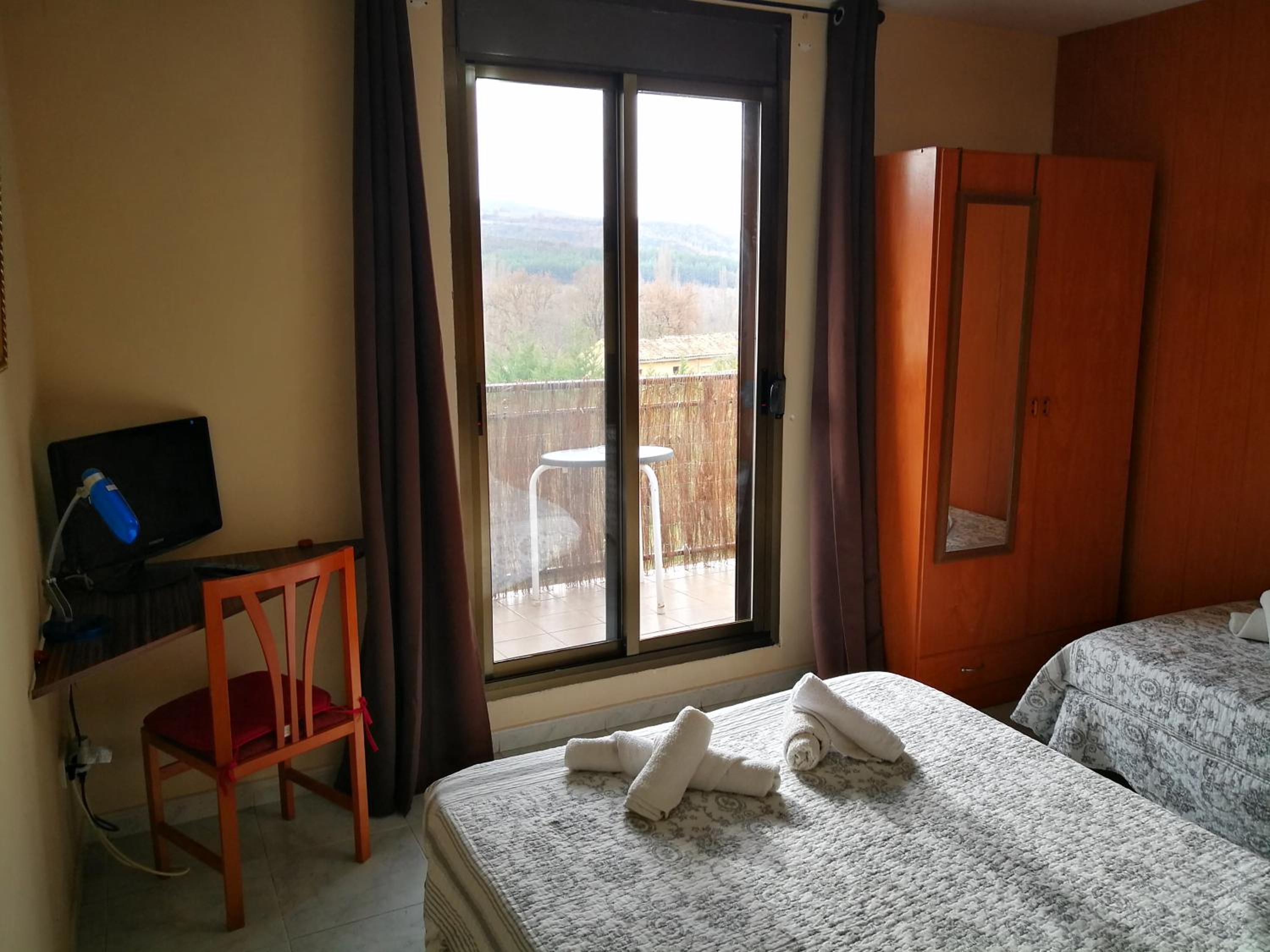 Habitación Triple con Vista a la Montaña