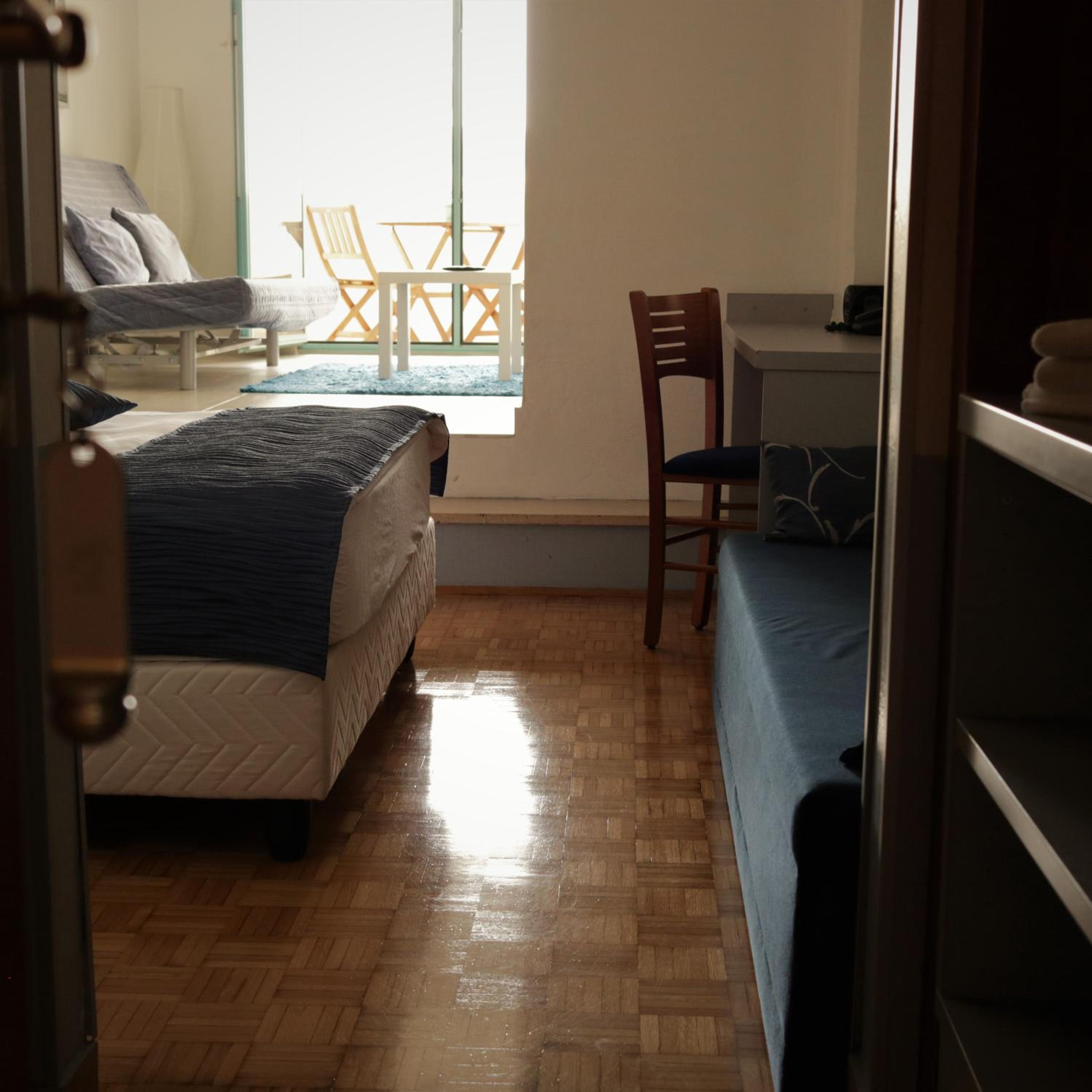 Quadruple Room with Balcony photo 3