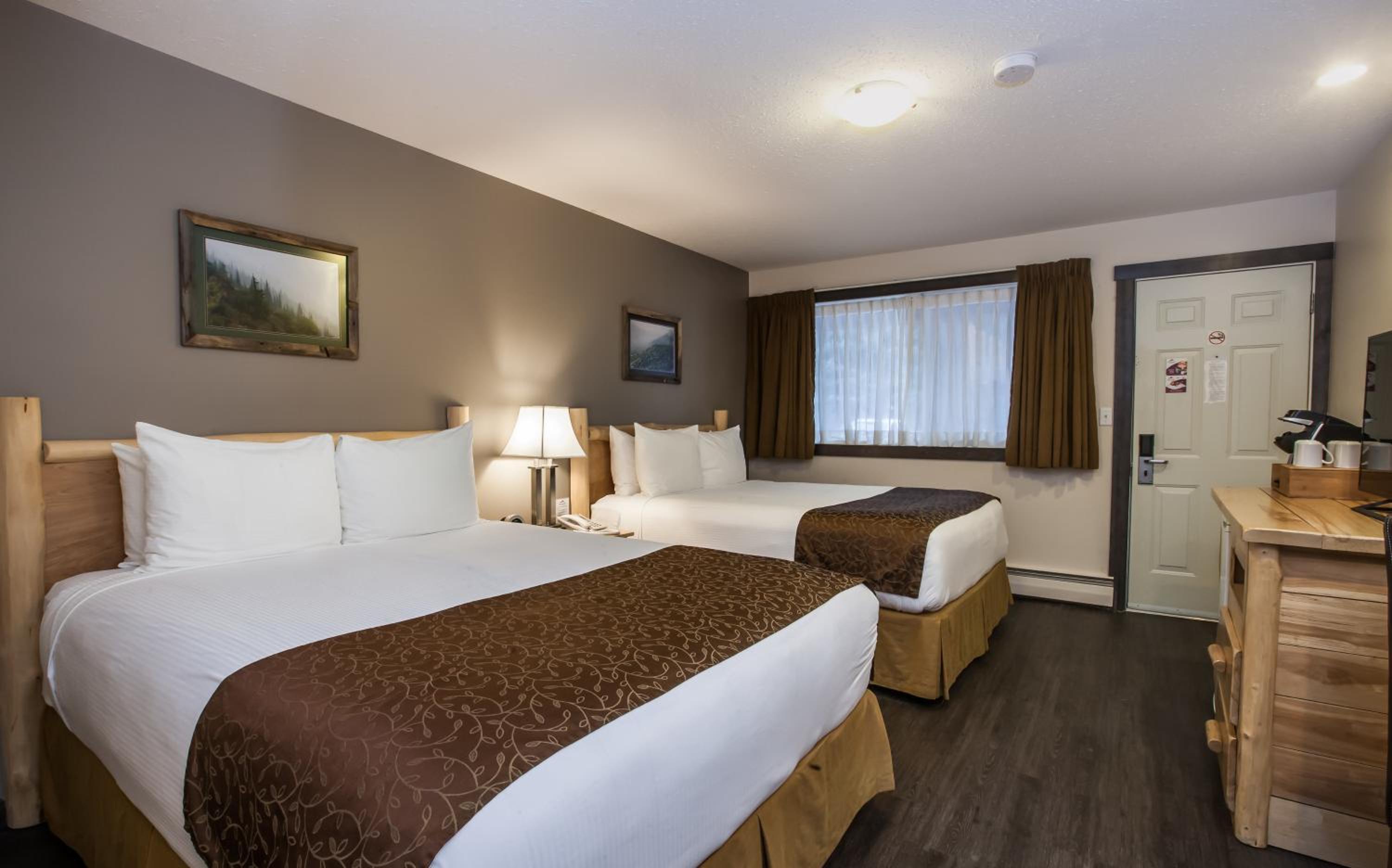 Standard Queen Room with Two Queen Beds Non-Pet Friendly - Photo 2