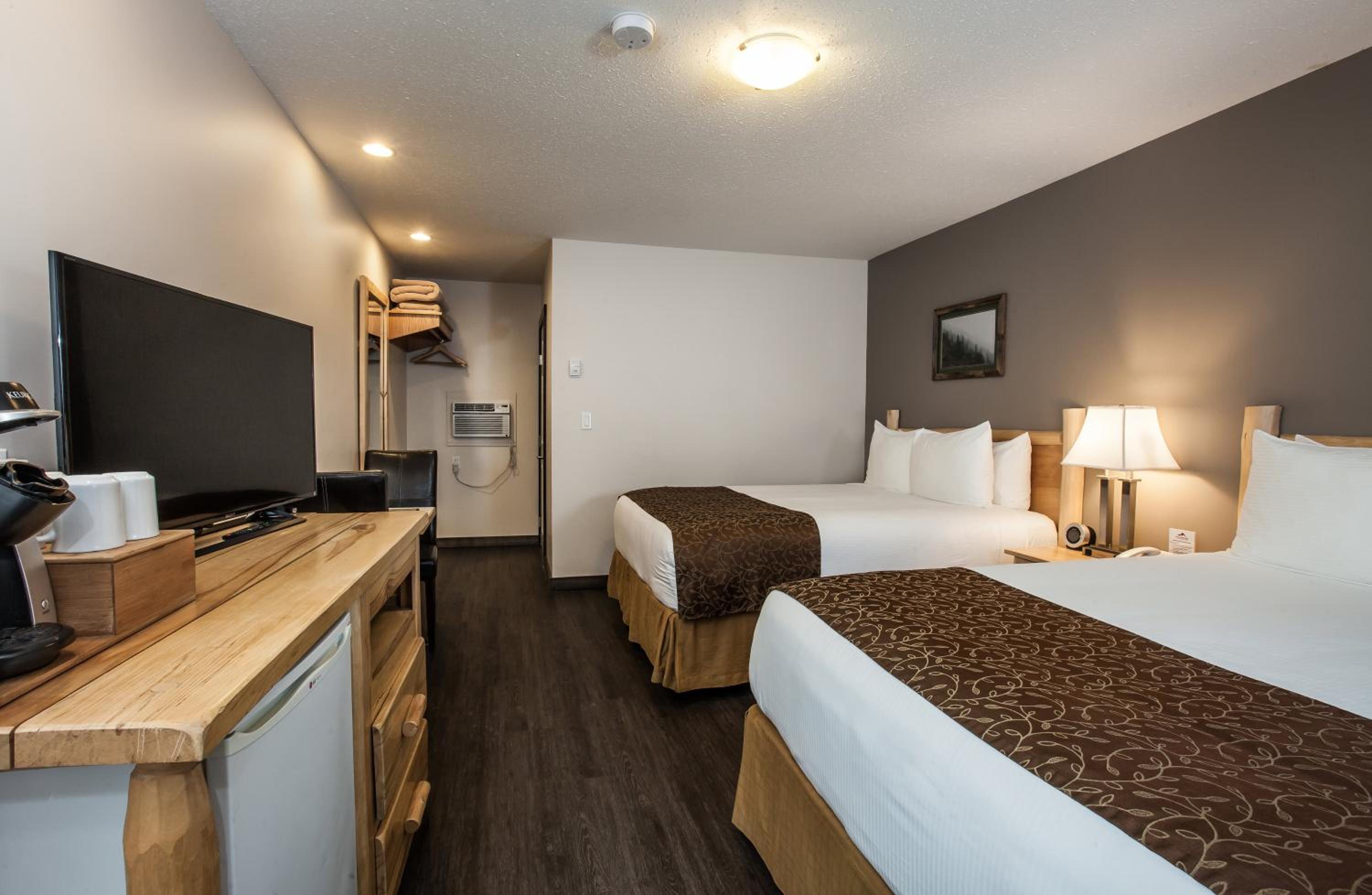 Standard Queen Room with Two Queen Beds Non-Pet Friendly - Photo 1