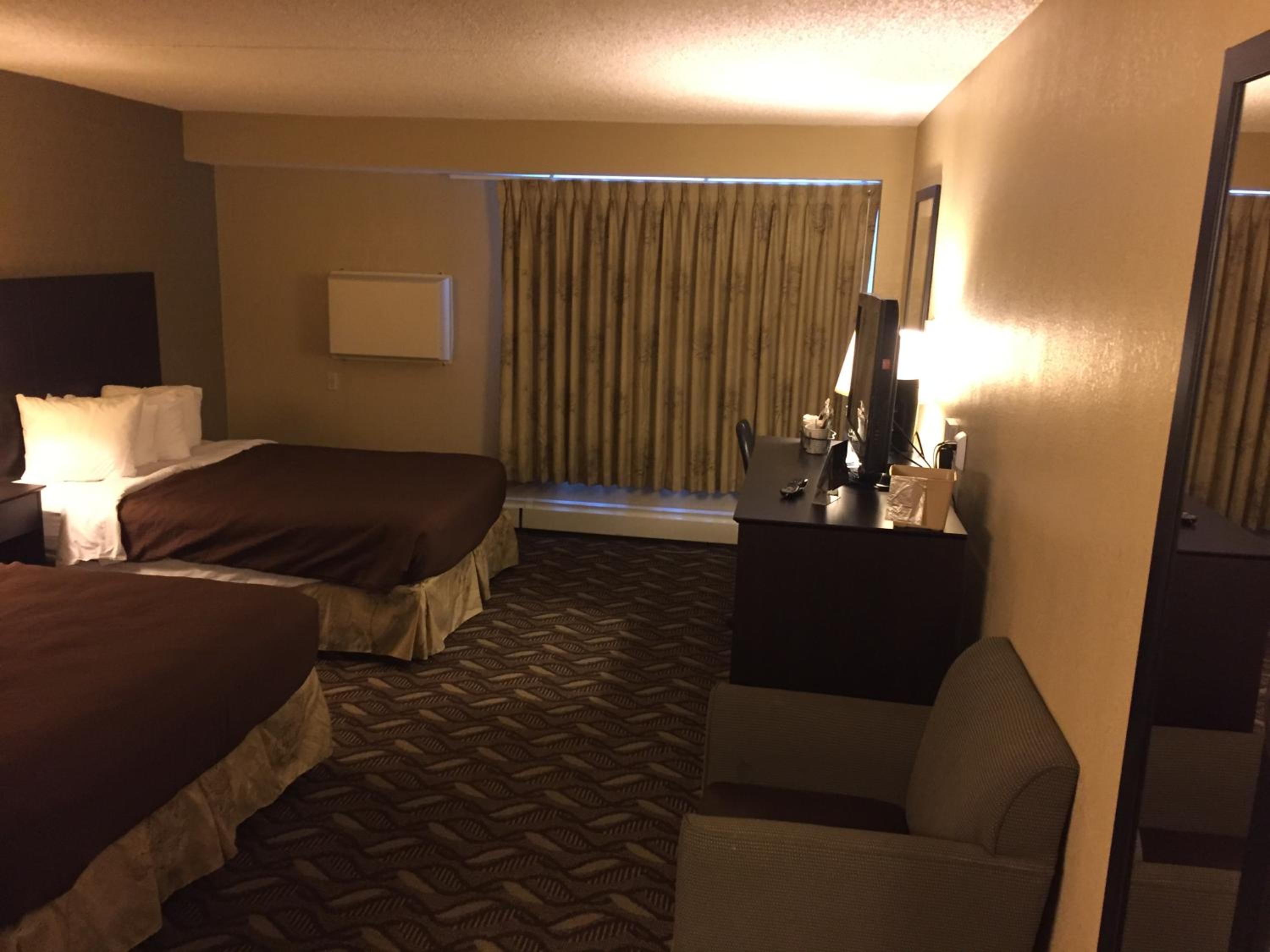 Deluxe Queen Room with Two Queen Beds - Non-Smoking - Photo 1