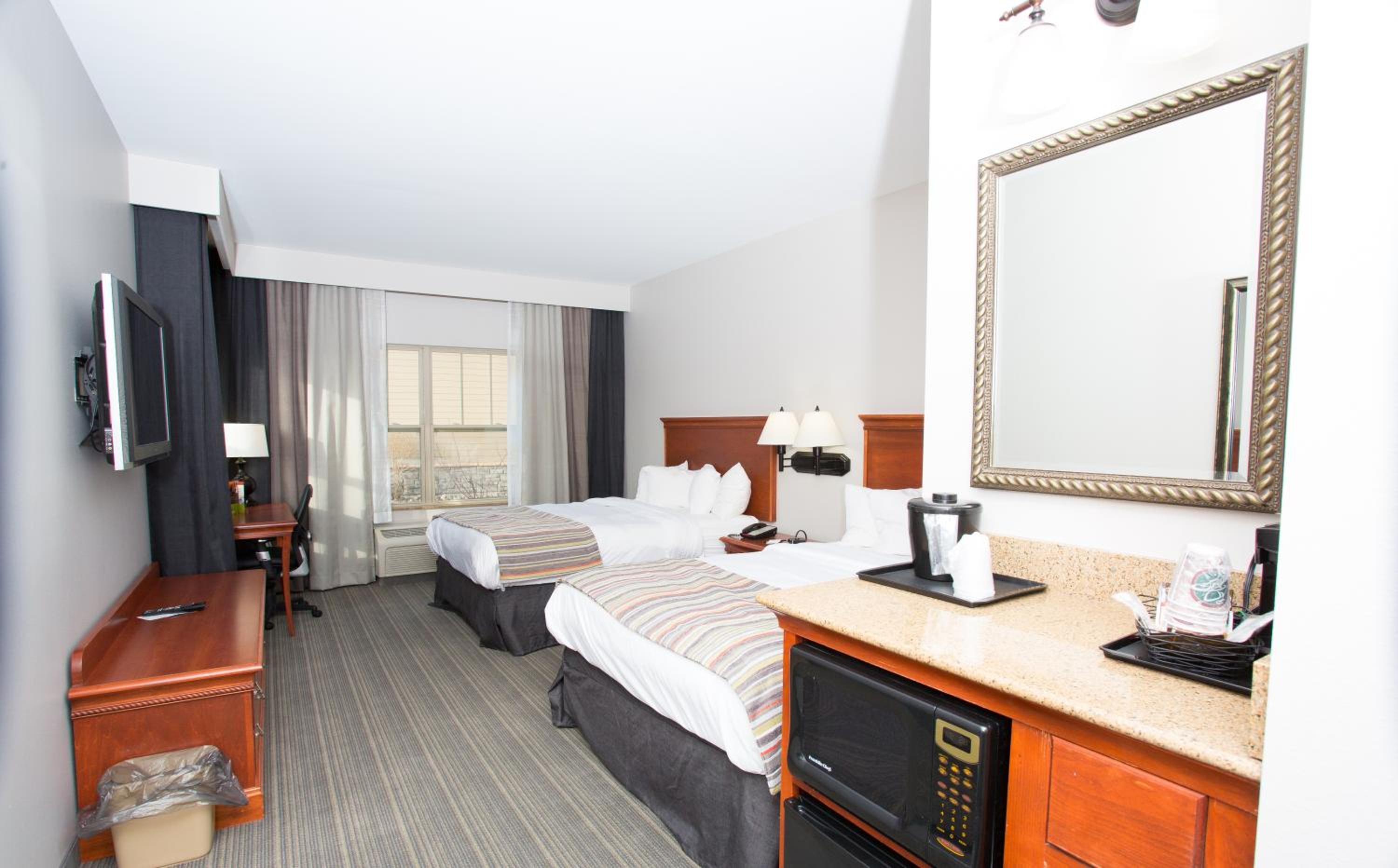 Queen Room with Two Queen Beds - Photo 1