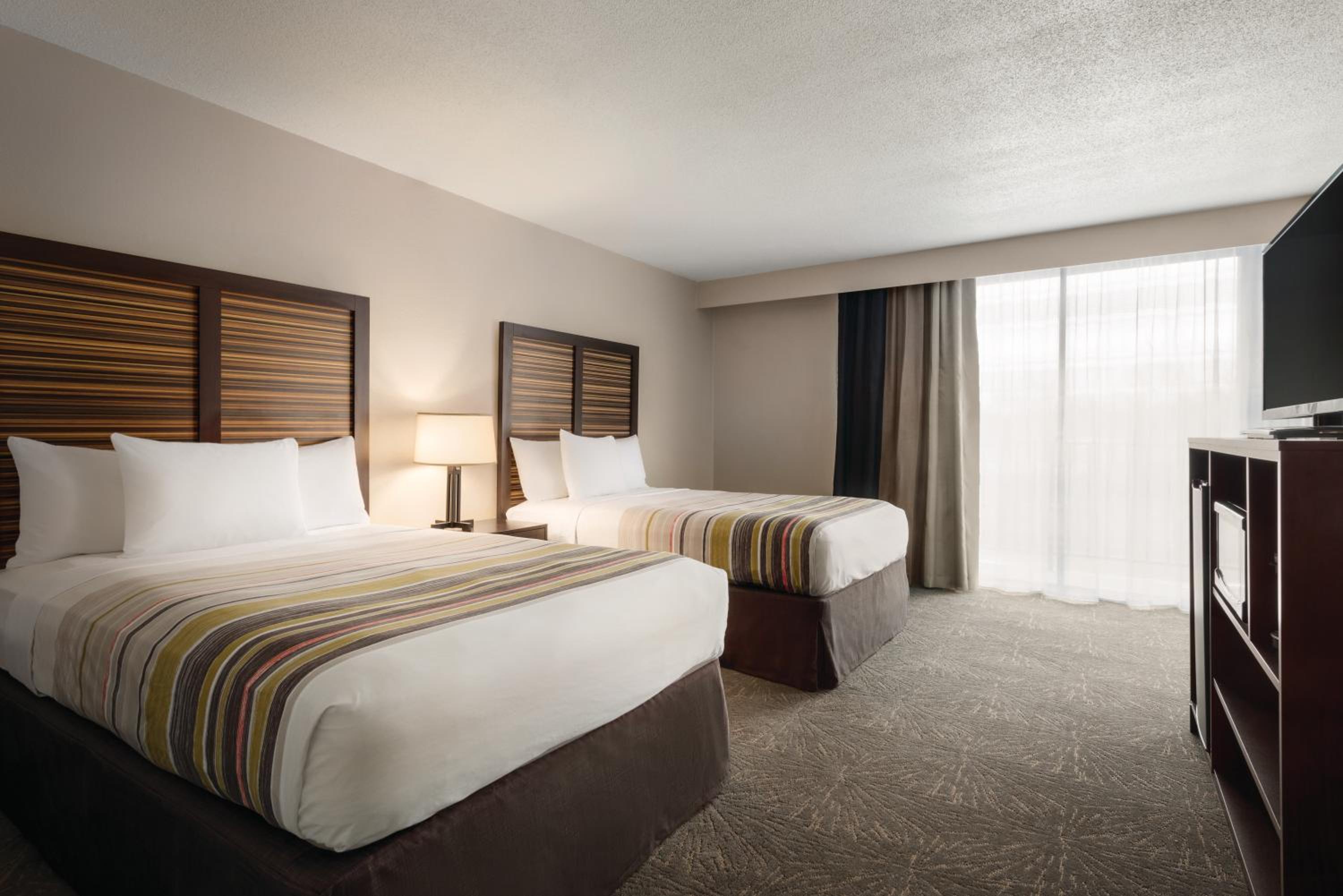 Double Room with Two Double Beds and Roll-In Shower - Non-Smoking photo 2