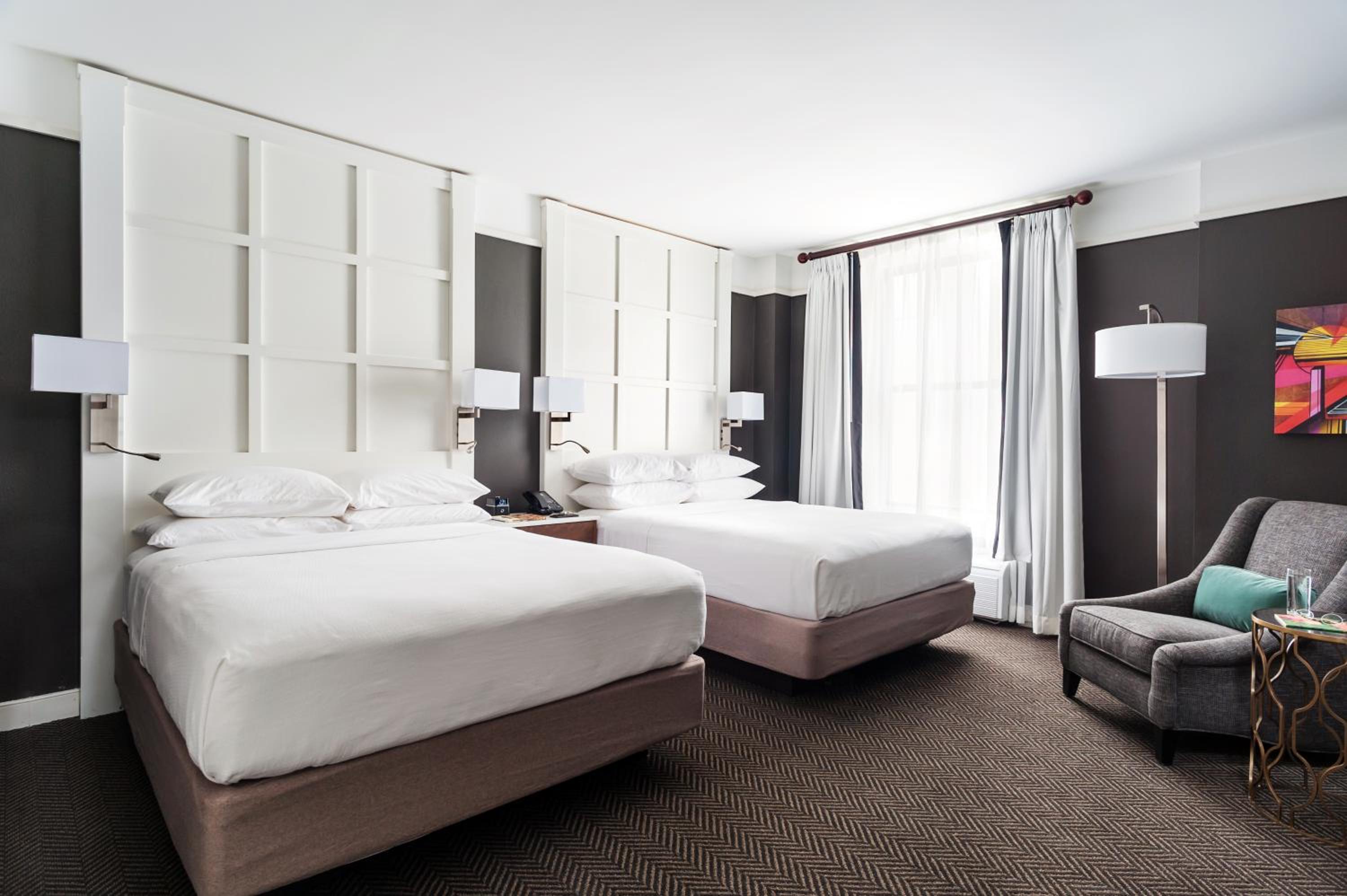 Roomy Two Queen Suite - Photo 6