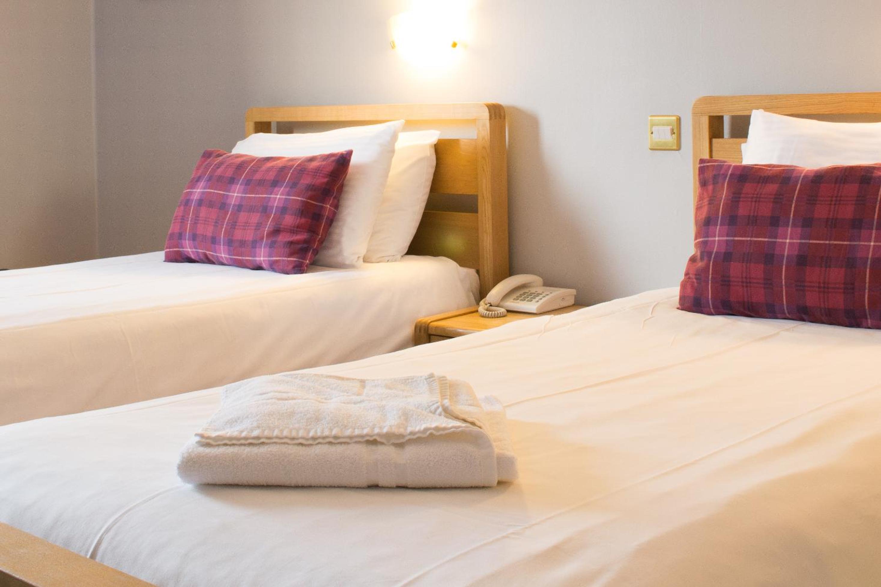 Standard Twin Room - Photo 3