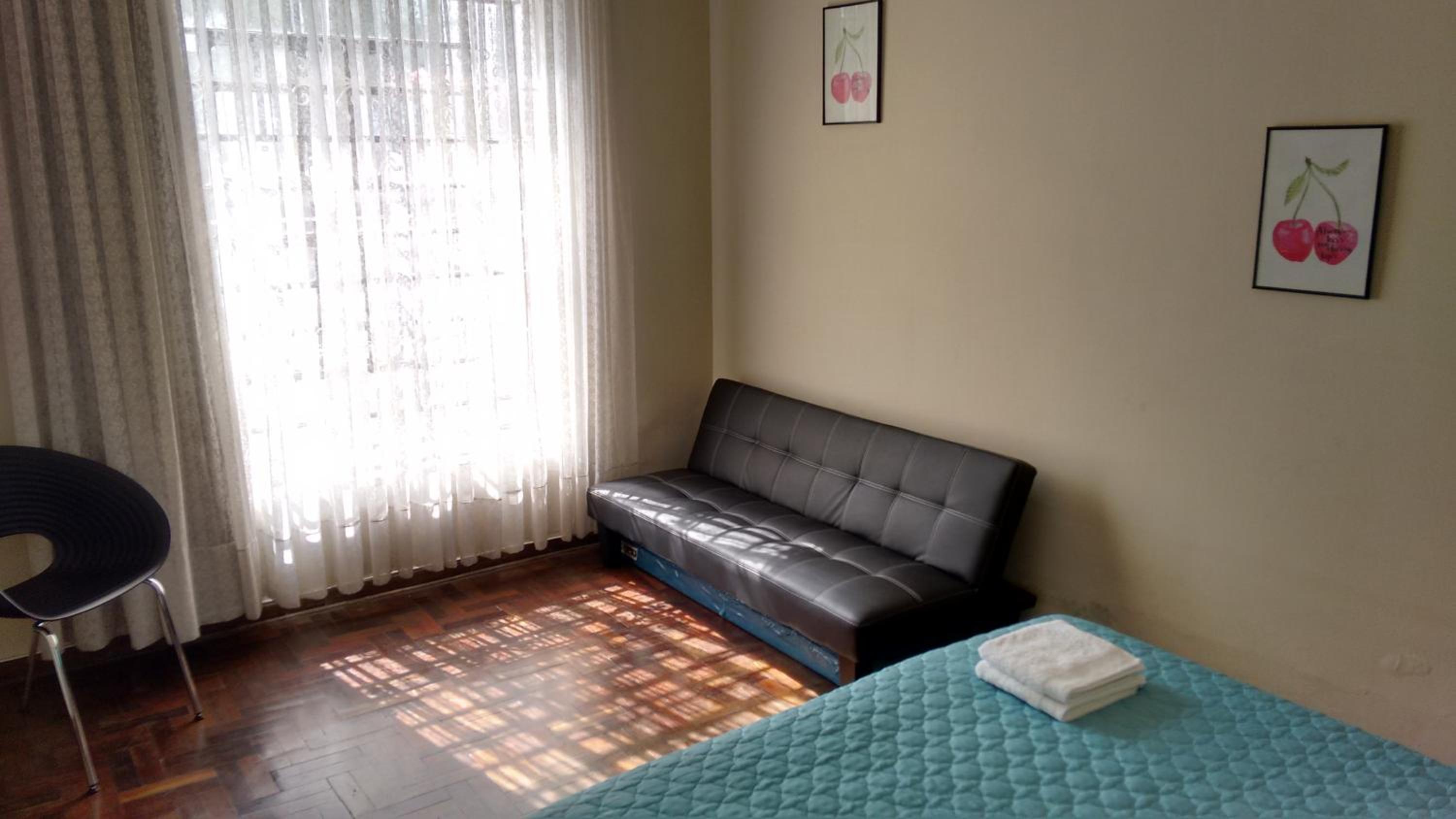 Economy Quadruple Room with Shared Bathroom
