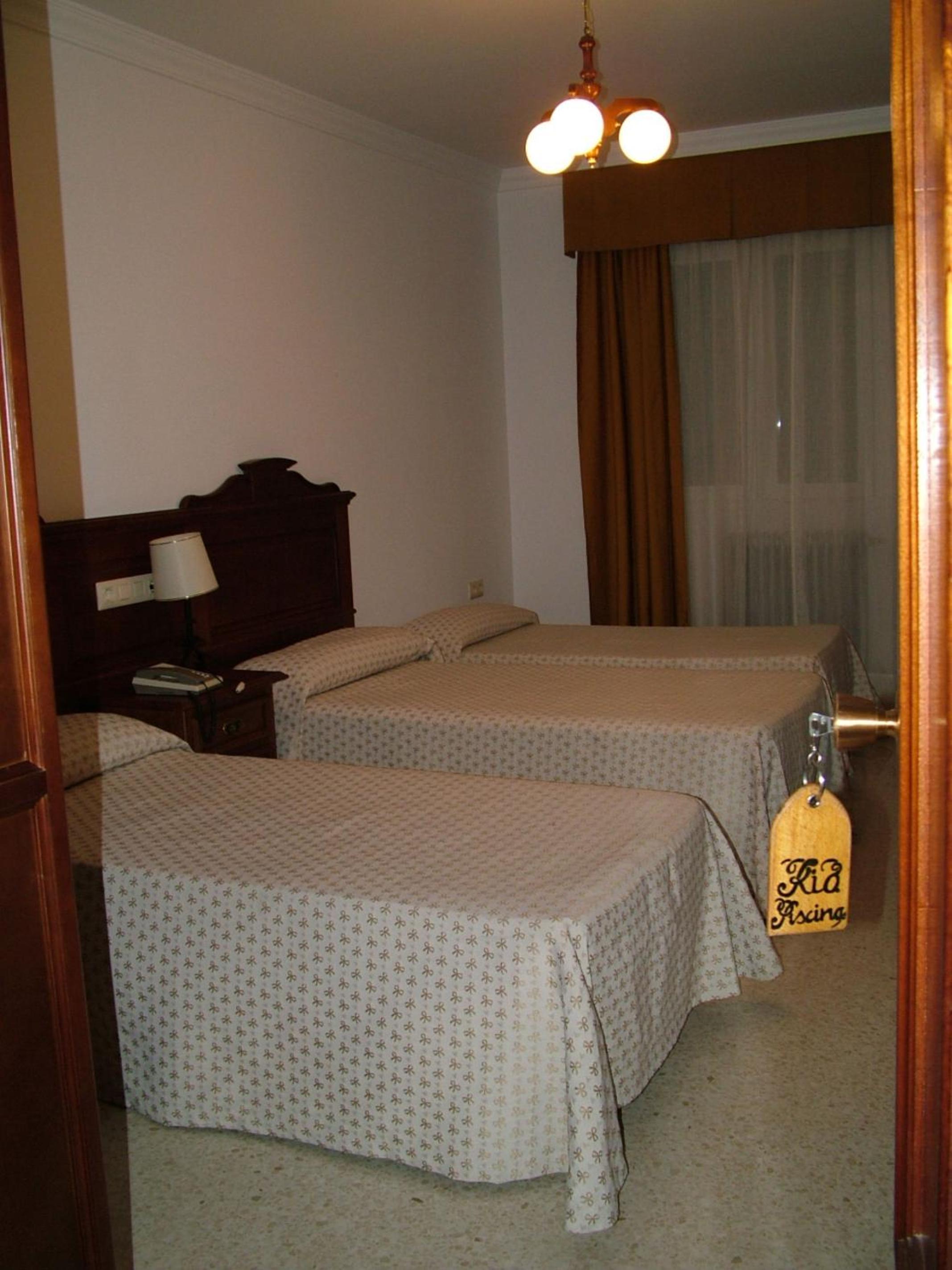 Triple Room - Photo 1