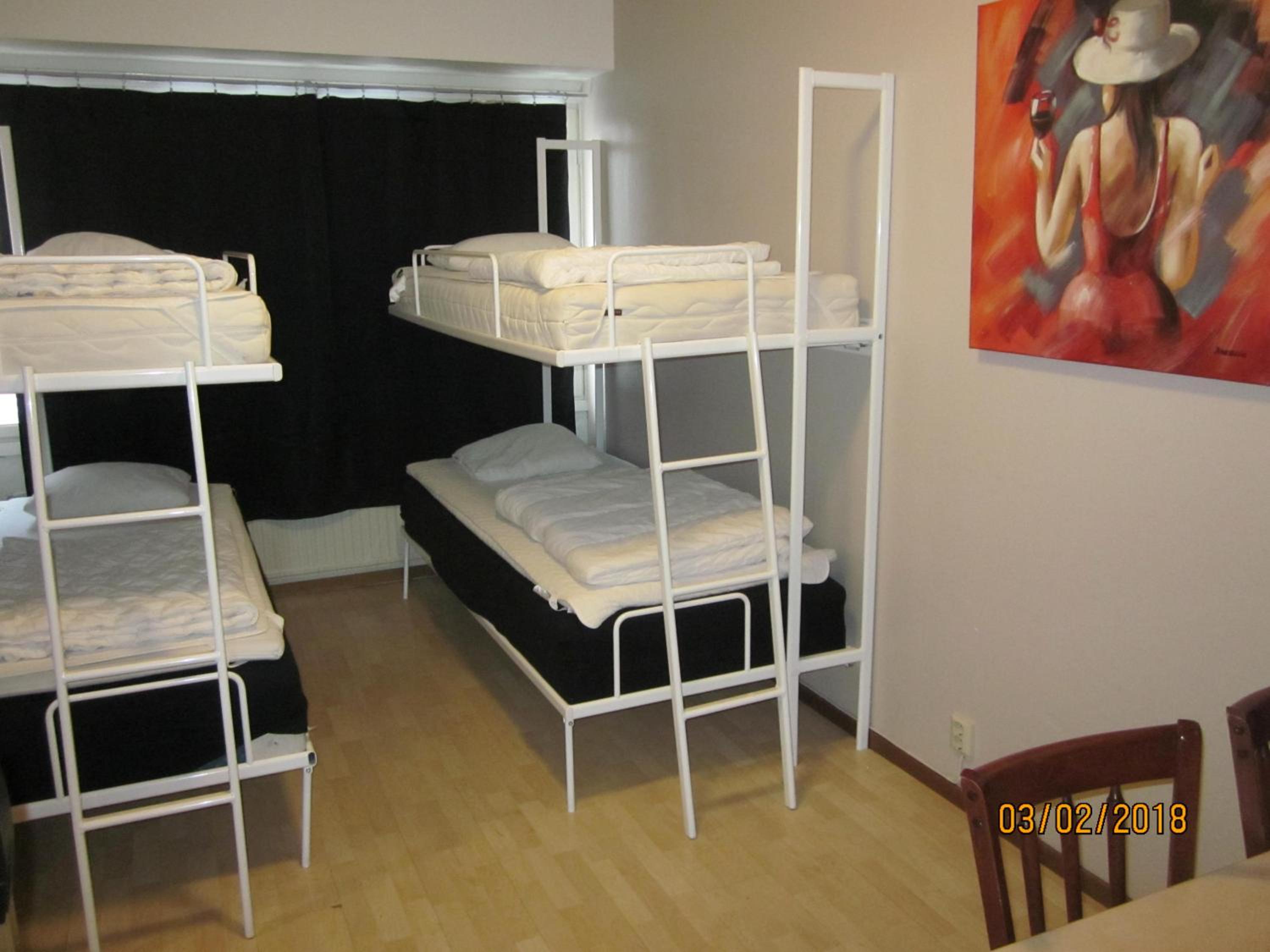 Quadruple Room with Shared Bathroom