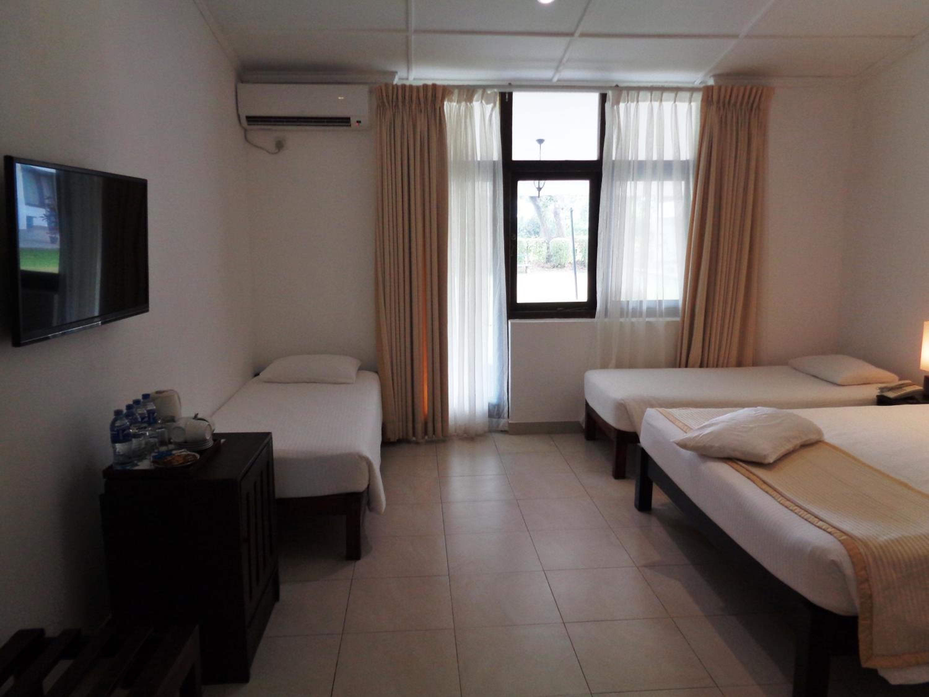 Deluxe Triple Room photo 2