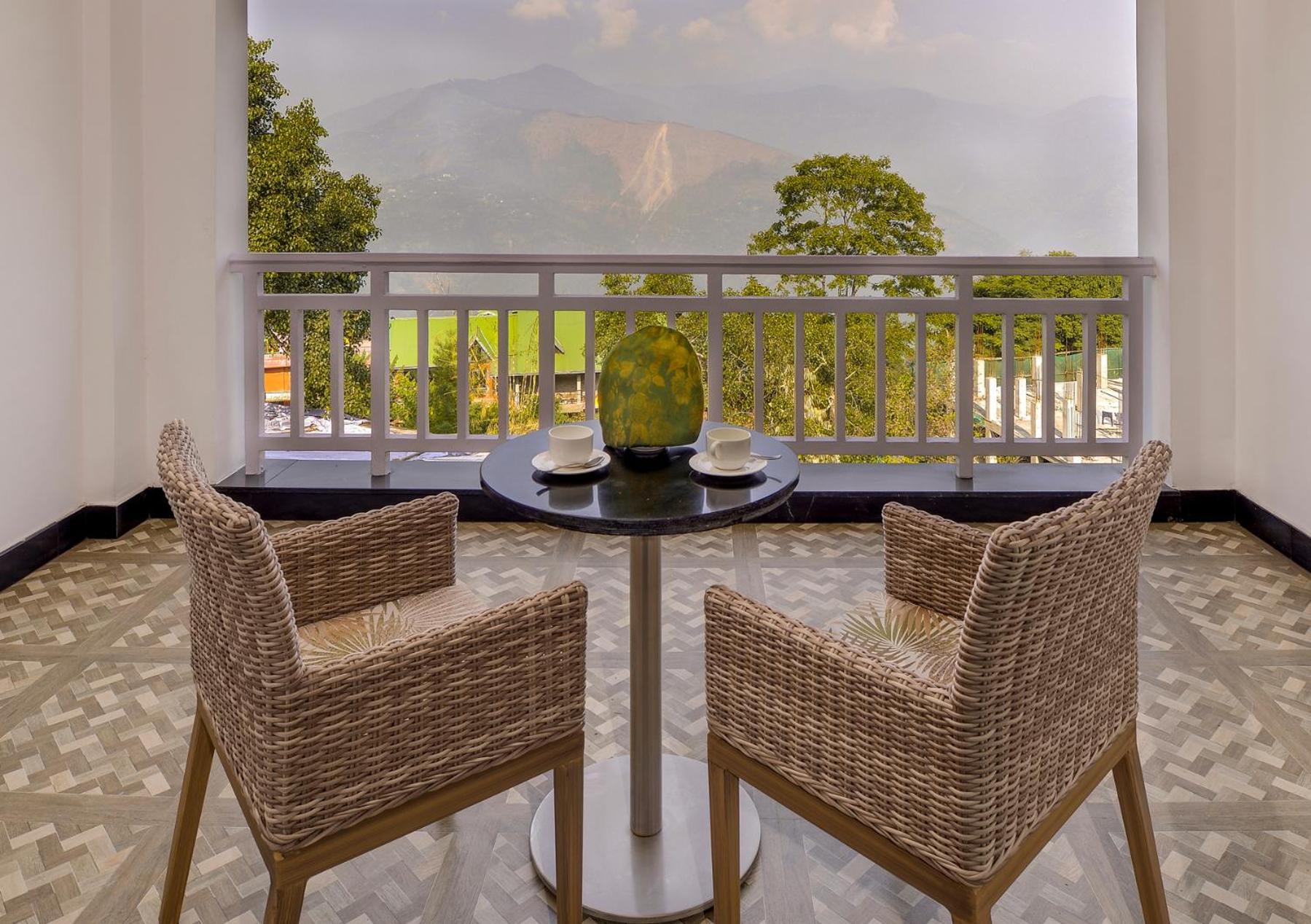Deluxe Room Kanchenjunga View - 10% Discount on Foods & Soft Beverages* | 15% Discounts on Laundry Services* | INR 500 spa credit during your stay on selective Massage services. TnC Apply.* | Free Minibar - 2 cans of soft Beverages (Once on Arrival)