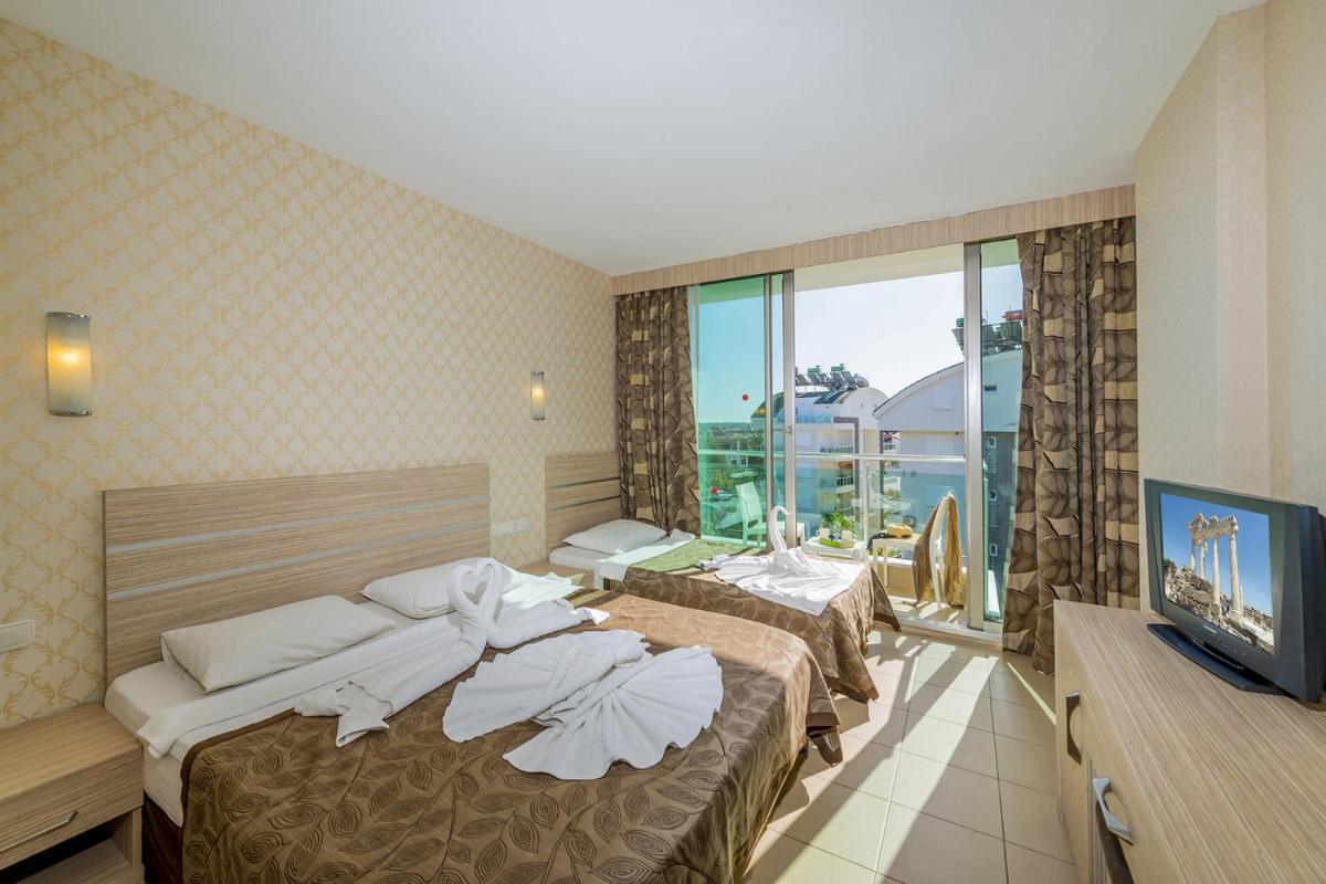 Standard Triple Room - Photo 1