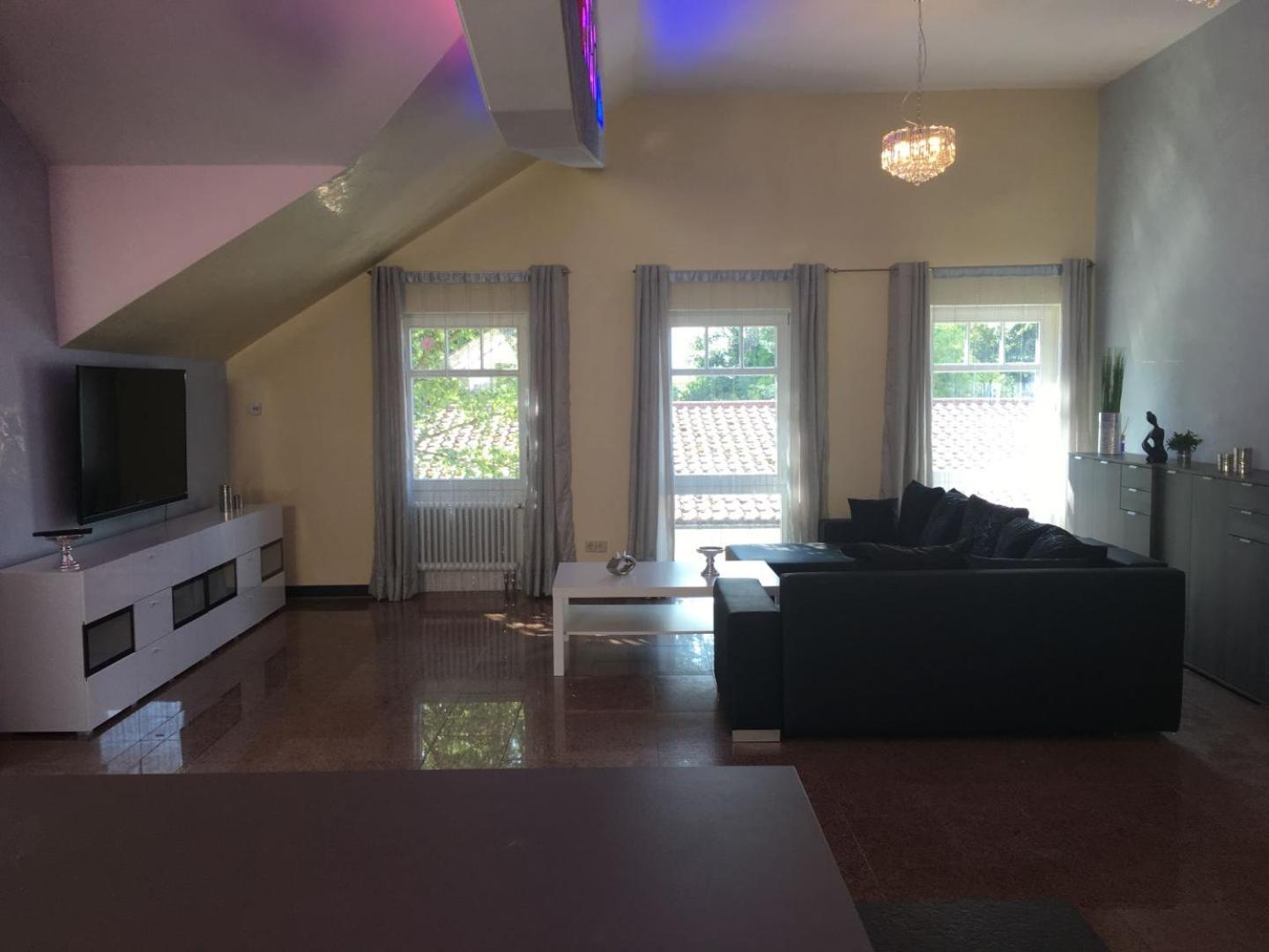 Three-Bedroom Apartment with Balcony photo 2