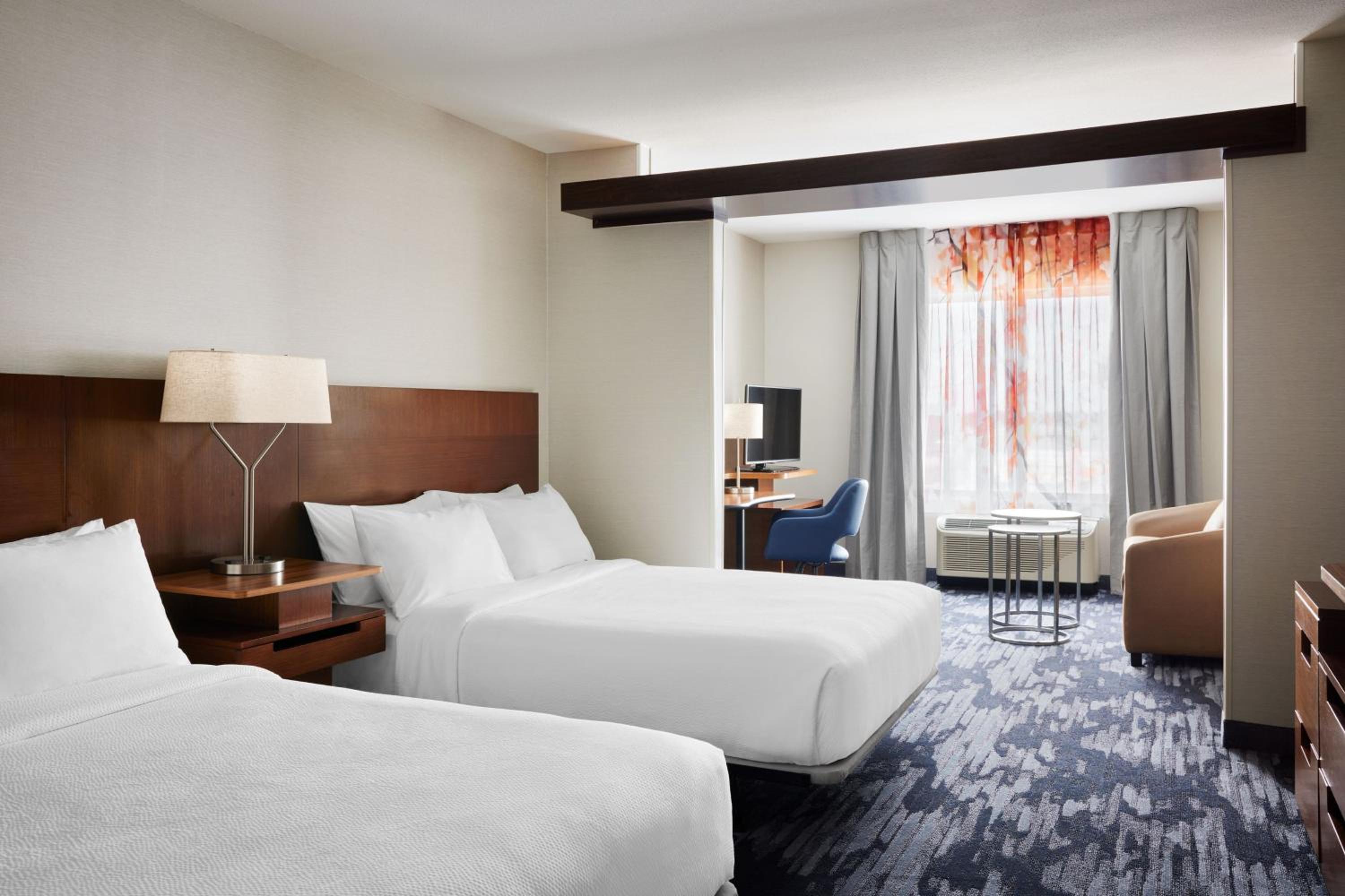 Queen Suite with Two Queen Beds and Sofa Bed
