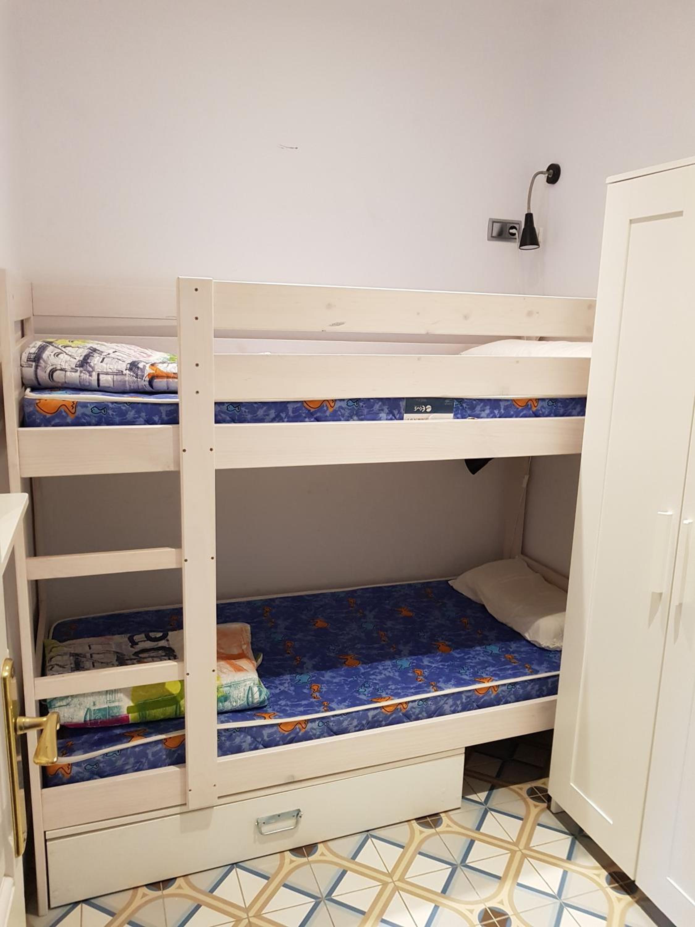 Three-Bedroom Apartment - Photo 16