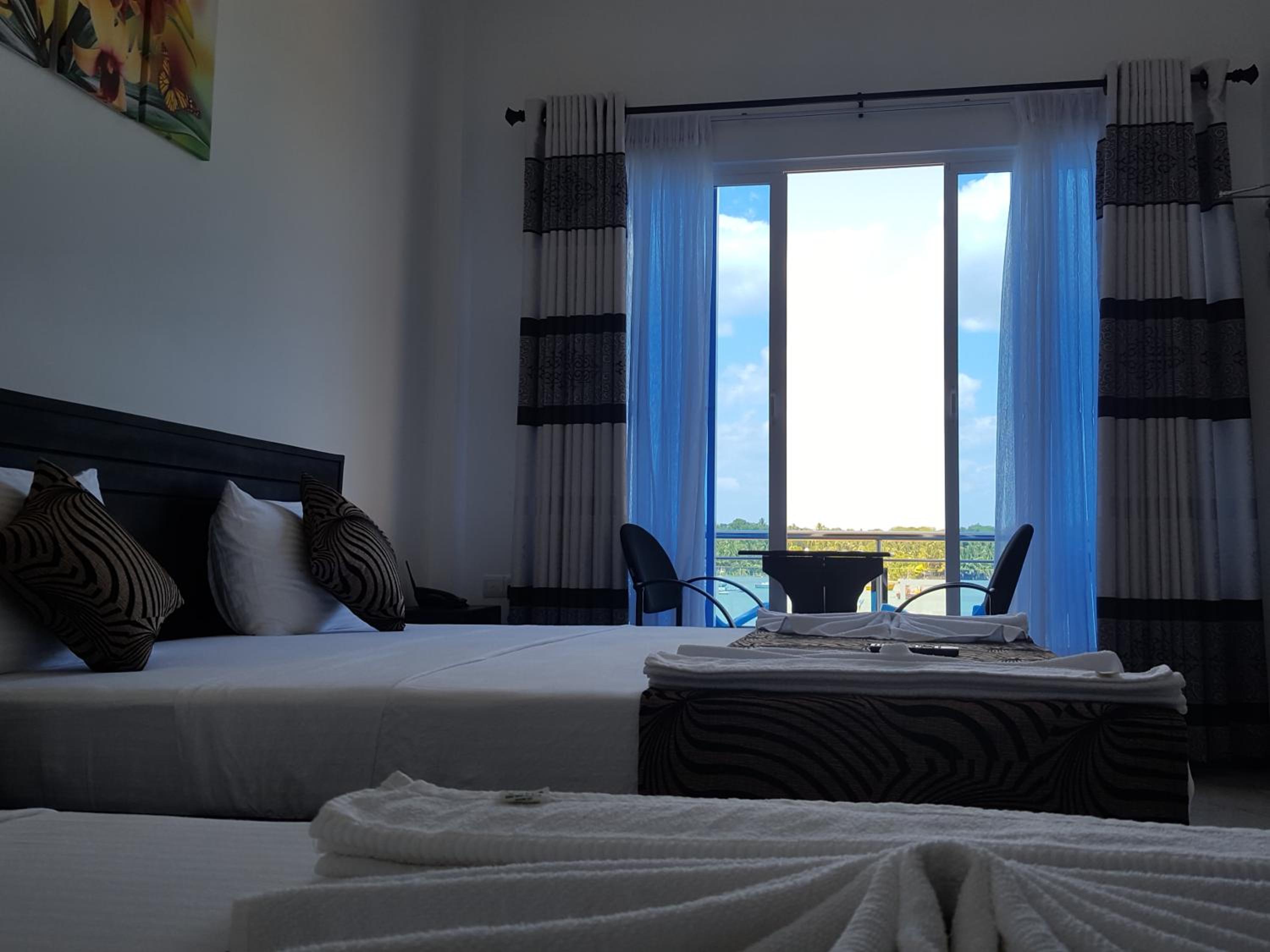 Deluxe Triple Room with Sea View