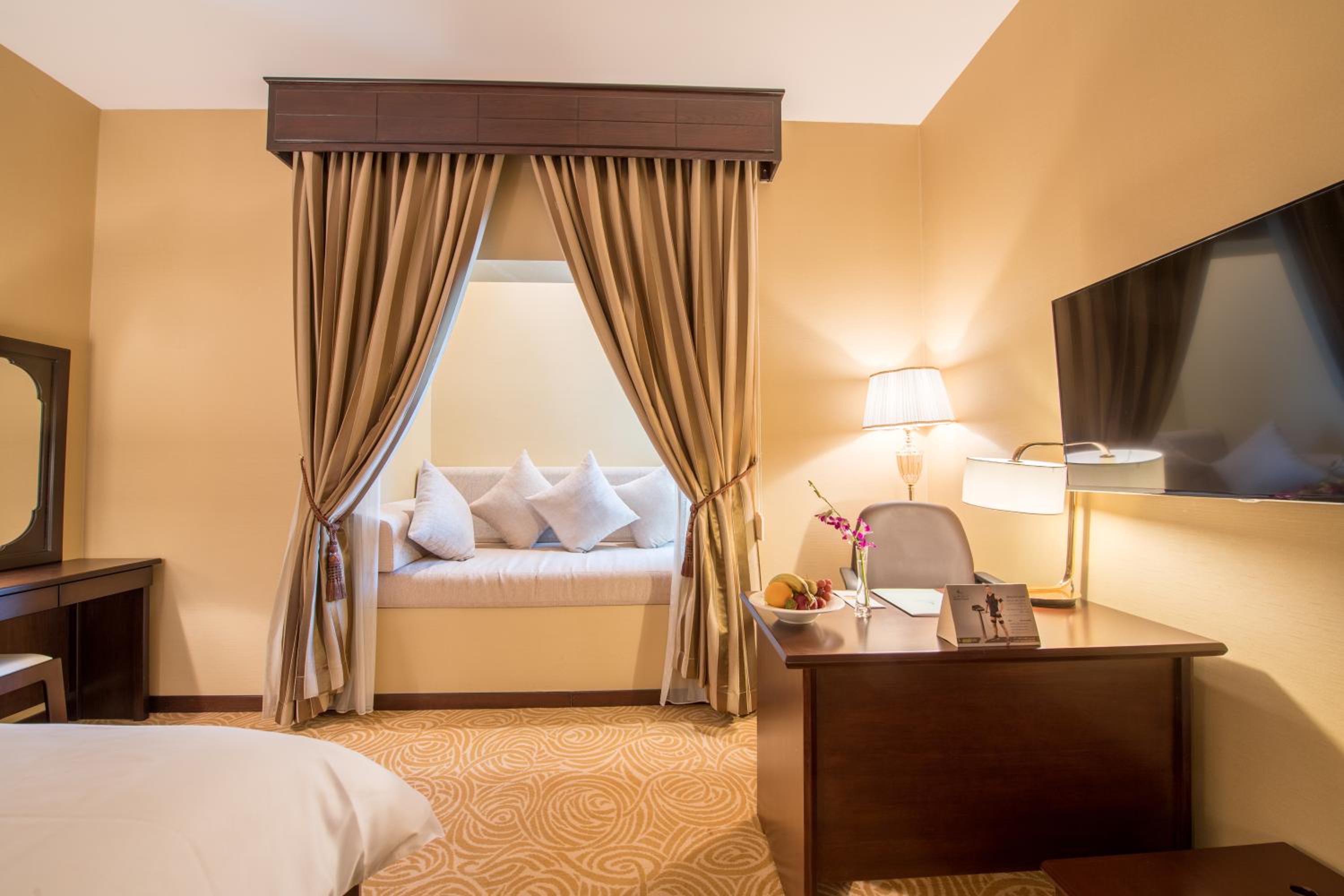 Deluxe Room - Photo 1
