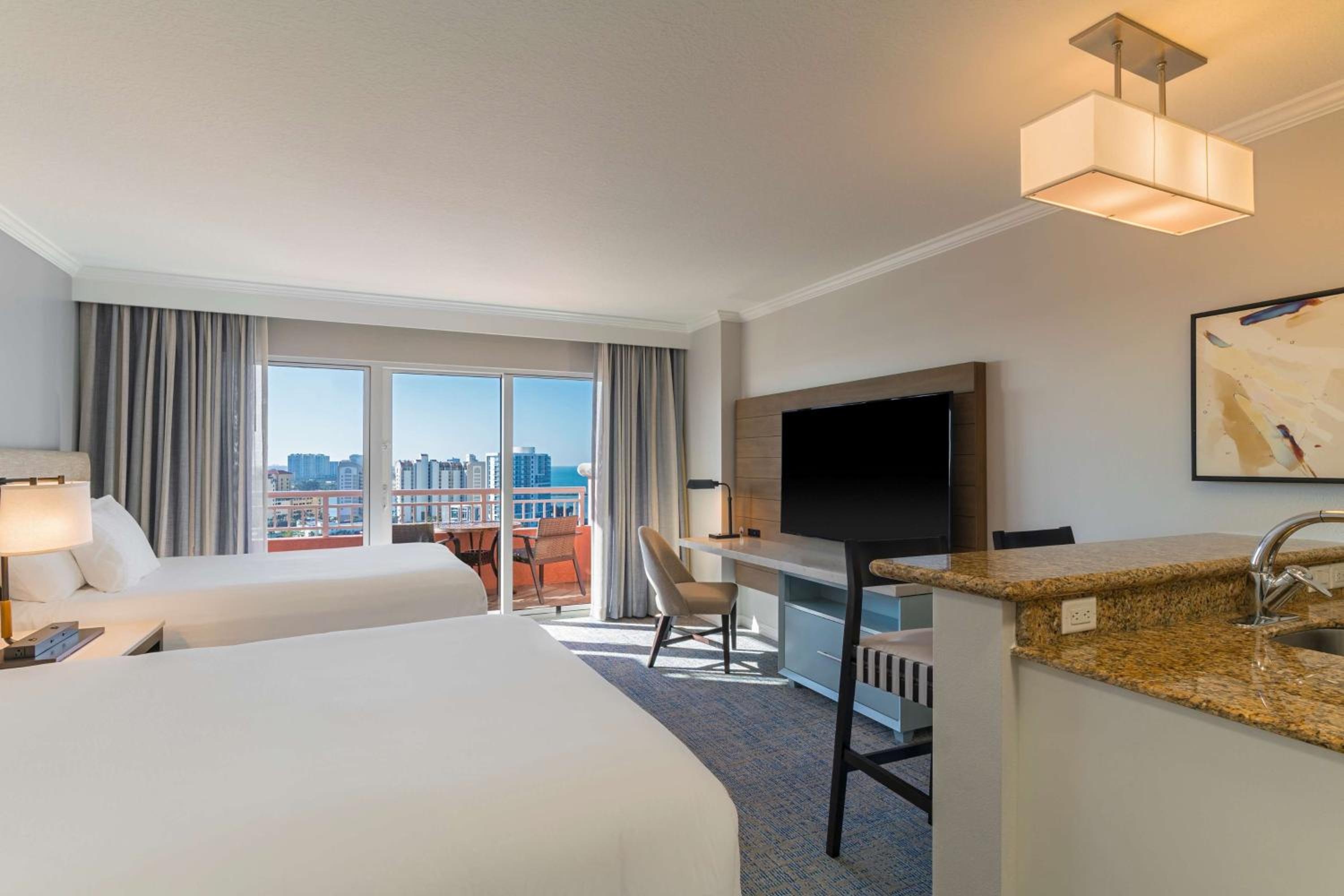 Deluxe Queen Room with Two Queen Beds with Kitchenette and Partial Ocean View - Photo 7