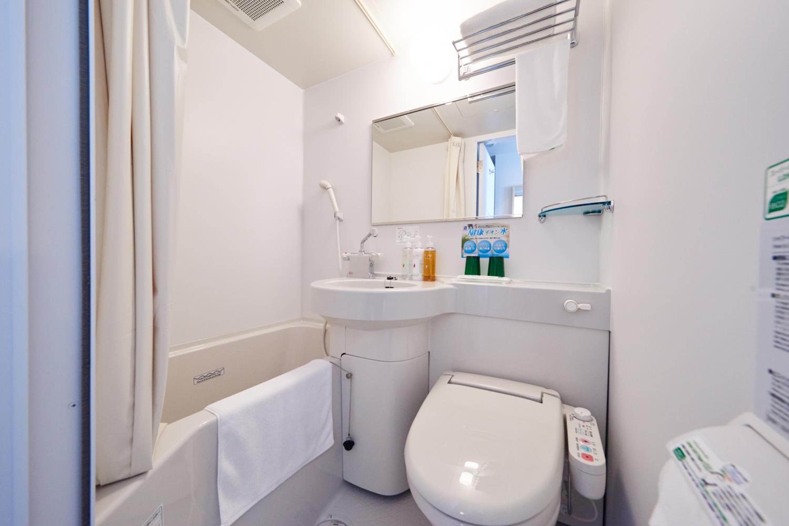 Economy Twin Room - Non-Smoking - Photo 8