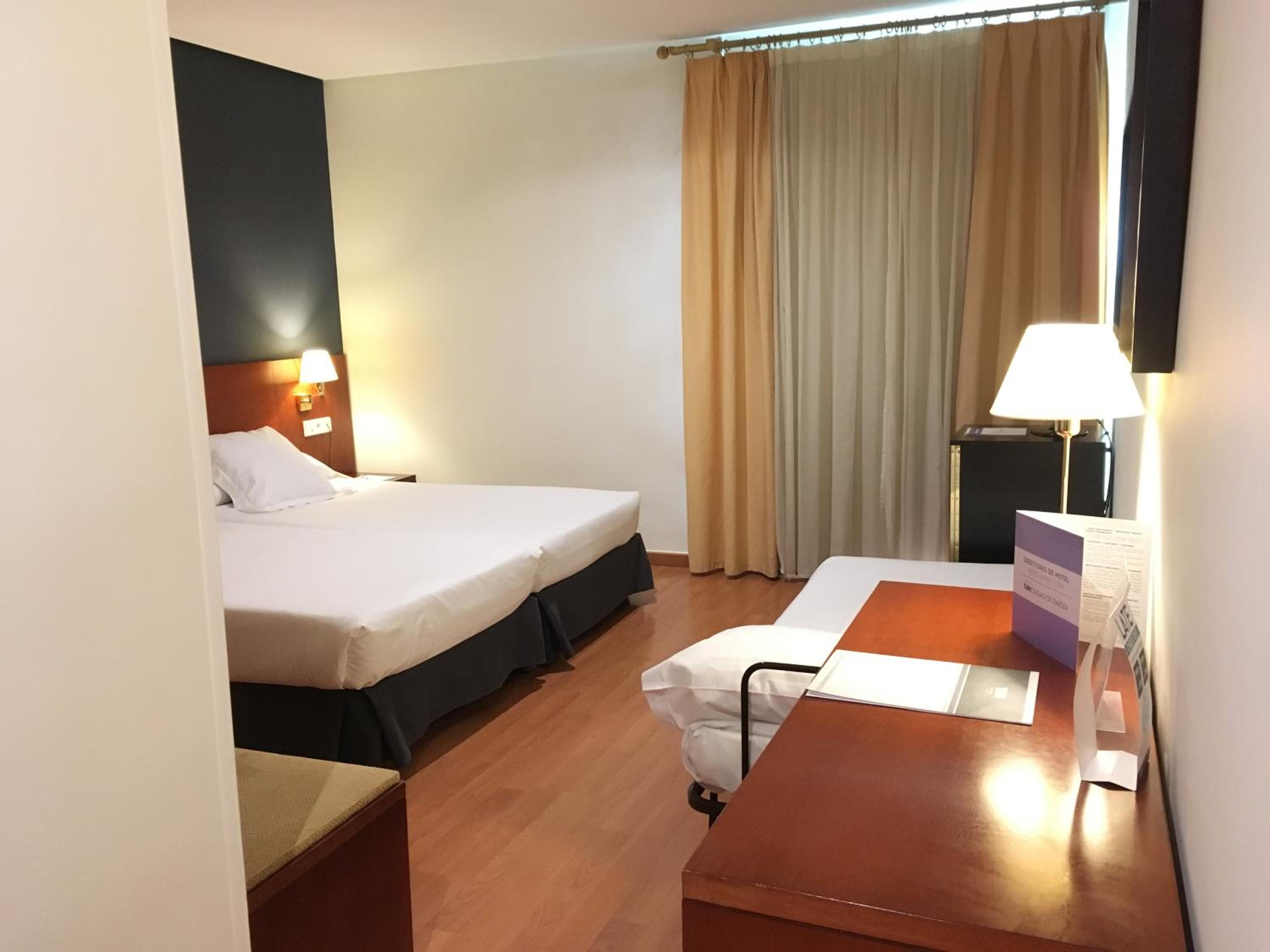 Habitación doble (2 adultos + 1 niño)