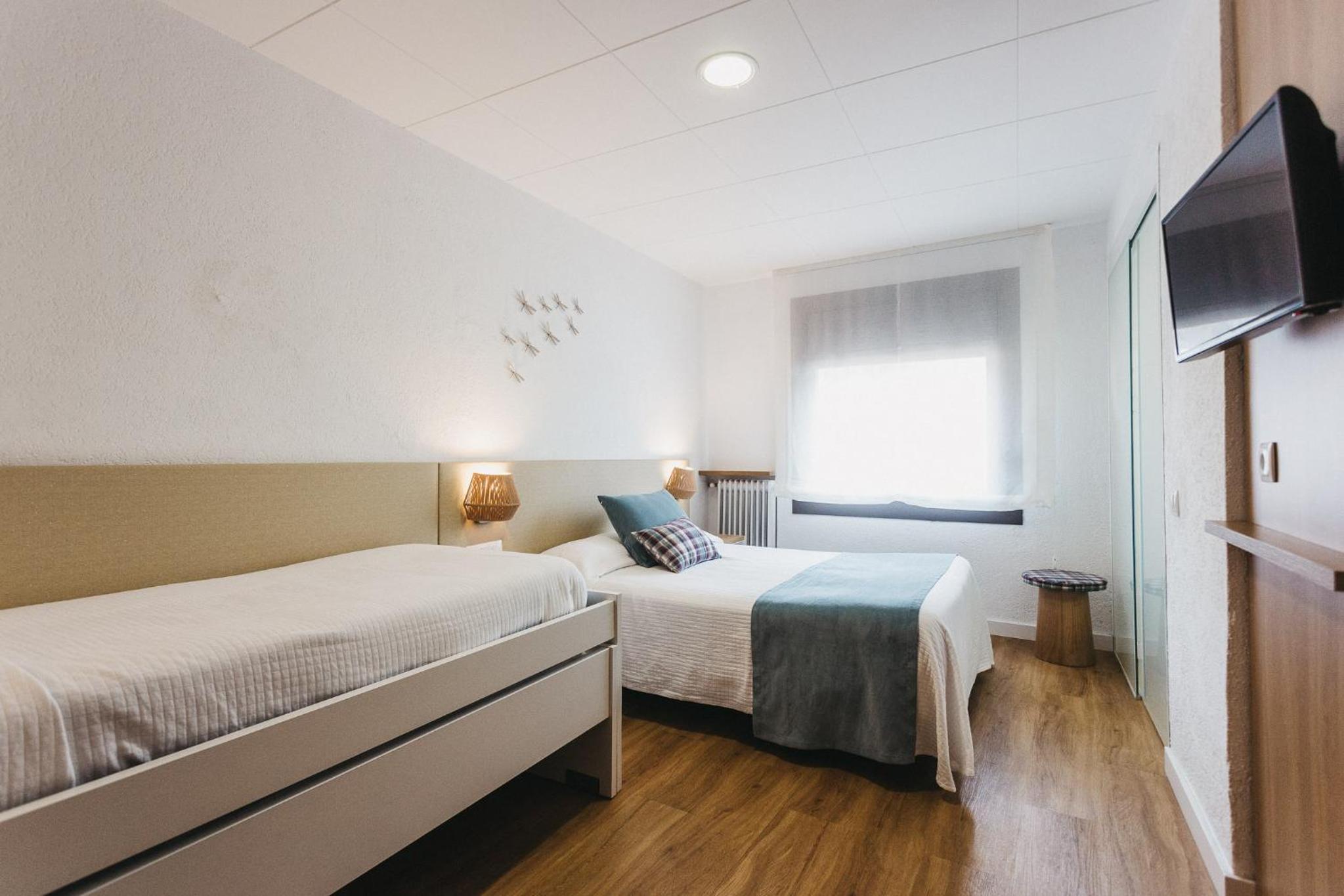 Habitación Cuádruple (2 Adultos + 2 Niños)