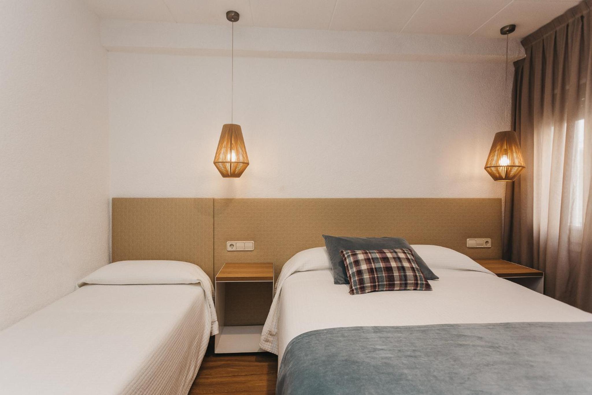 Triple Room (2 Adults + 1 Child) photo 2
