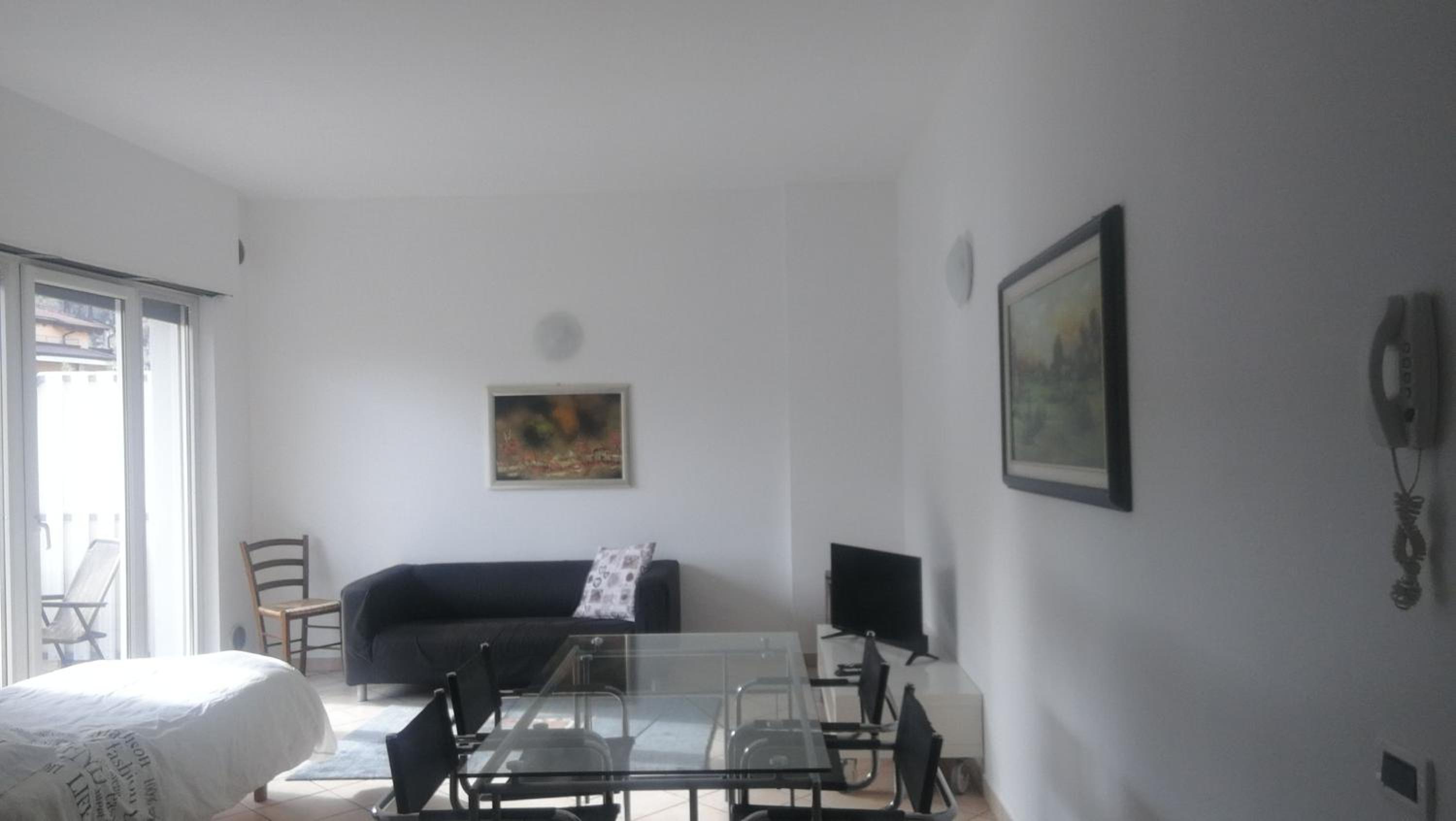 Apartment with Balcony - Photo 6