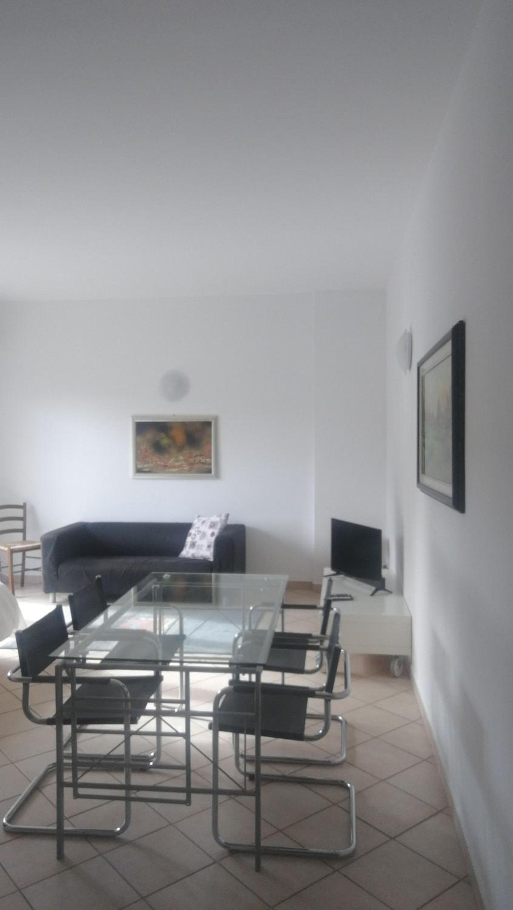 Apartment with Balcony - Photo 7