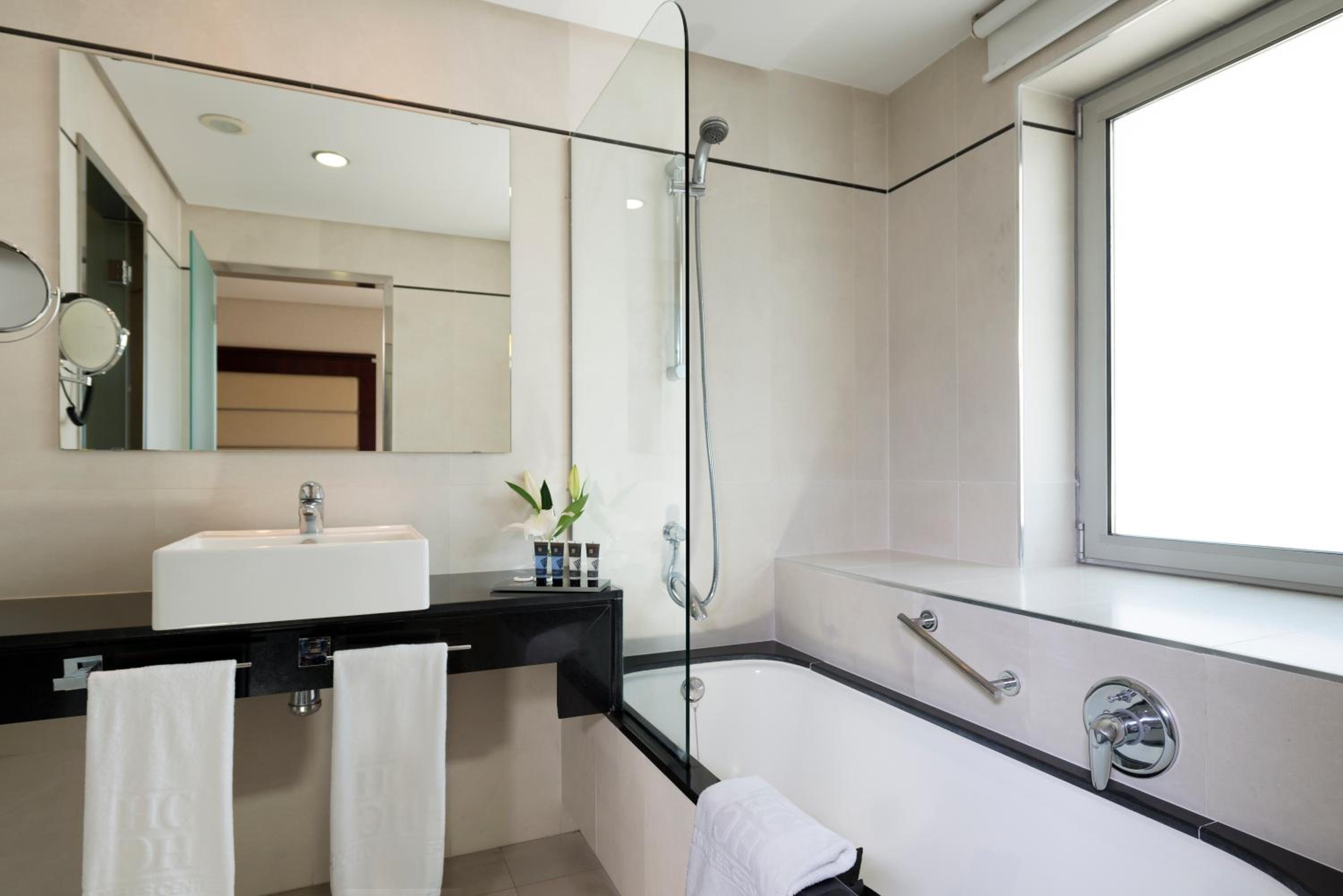 Relax in elegance and comfort in our stylish bathrooms.