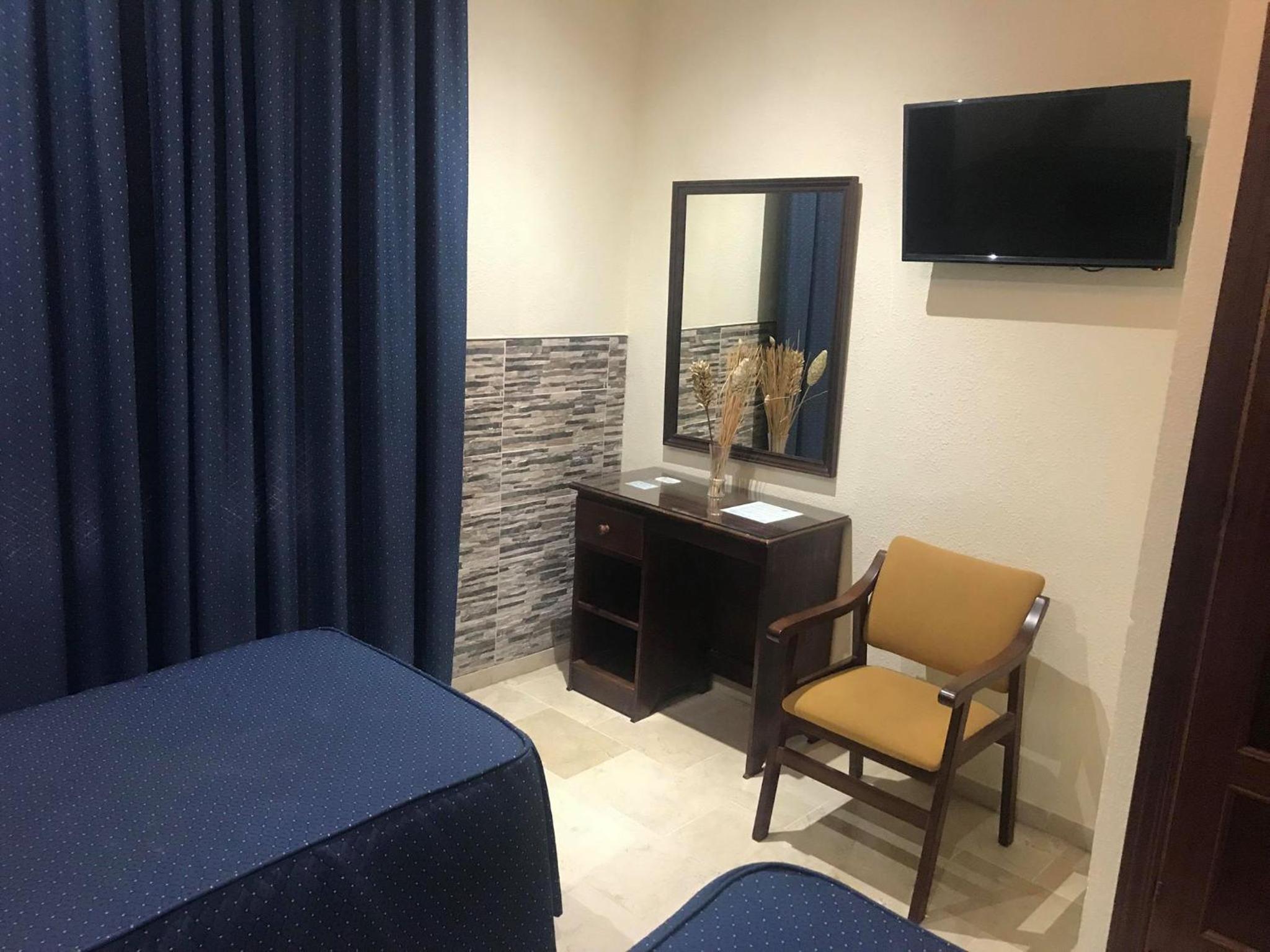 Triple Room - Photo 1