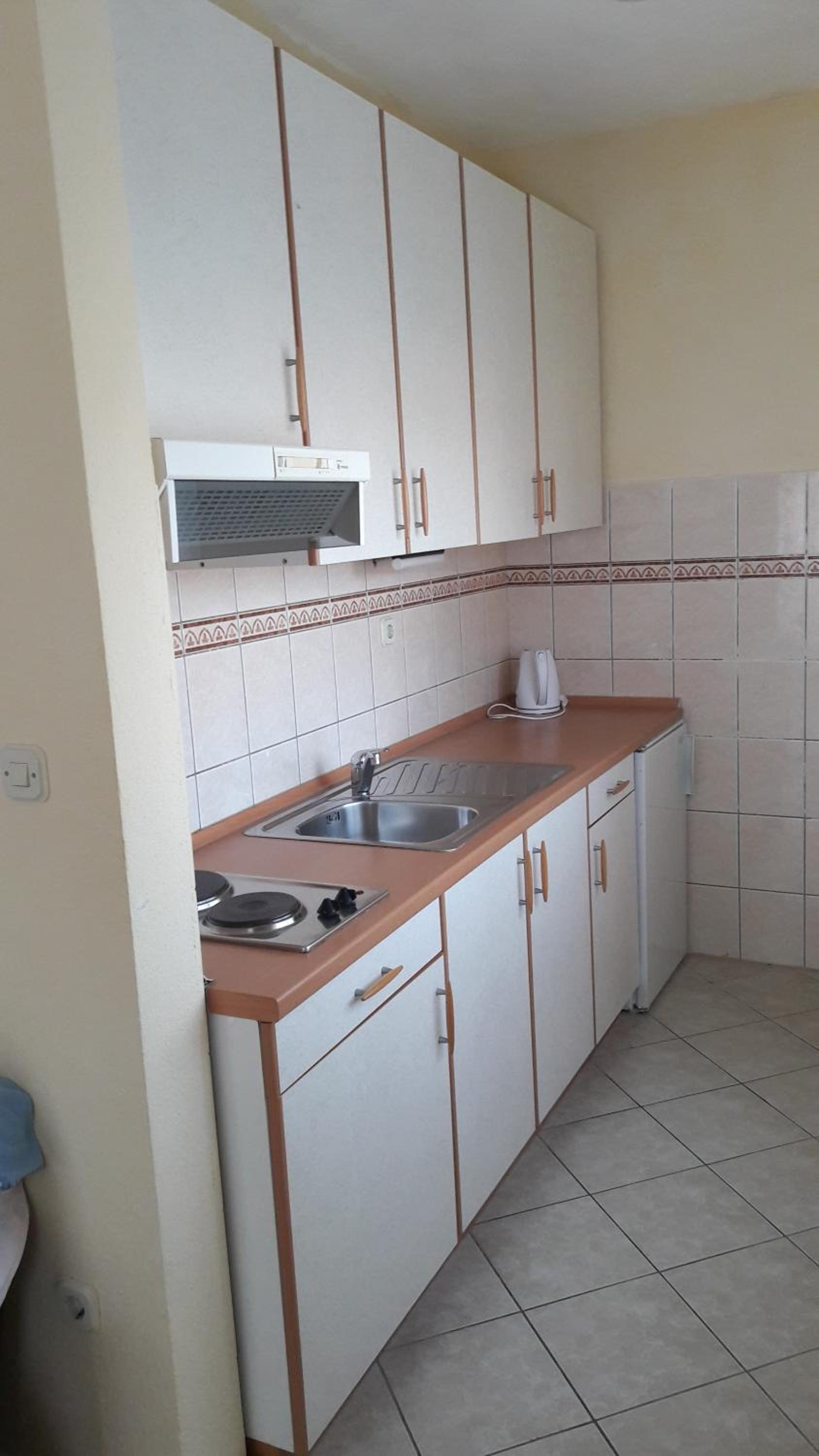 Apartment with Balcony - Photo 8