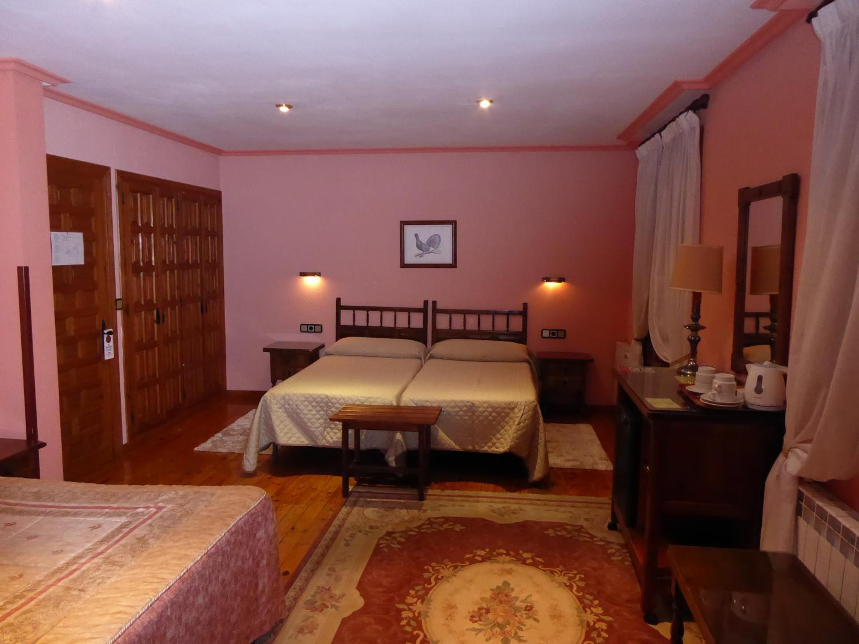Habitación Cuádruple con Vista al Jardín