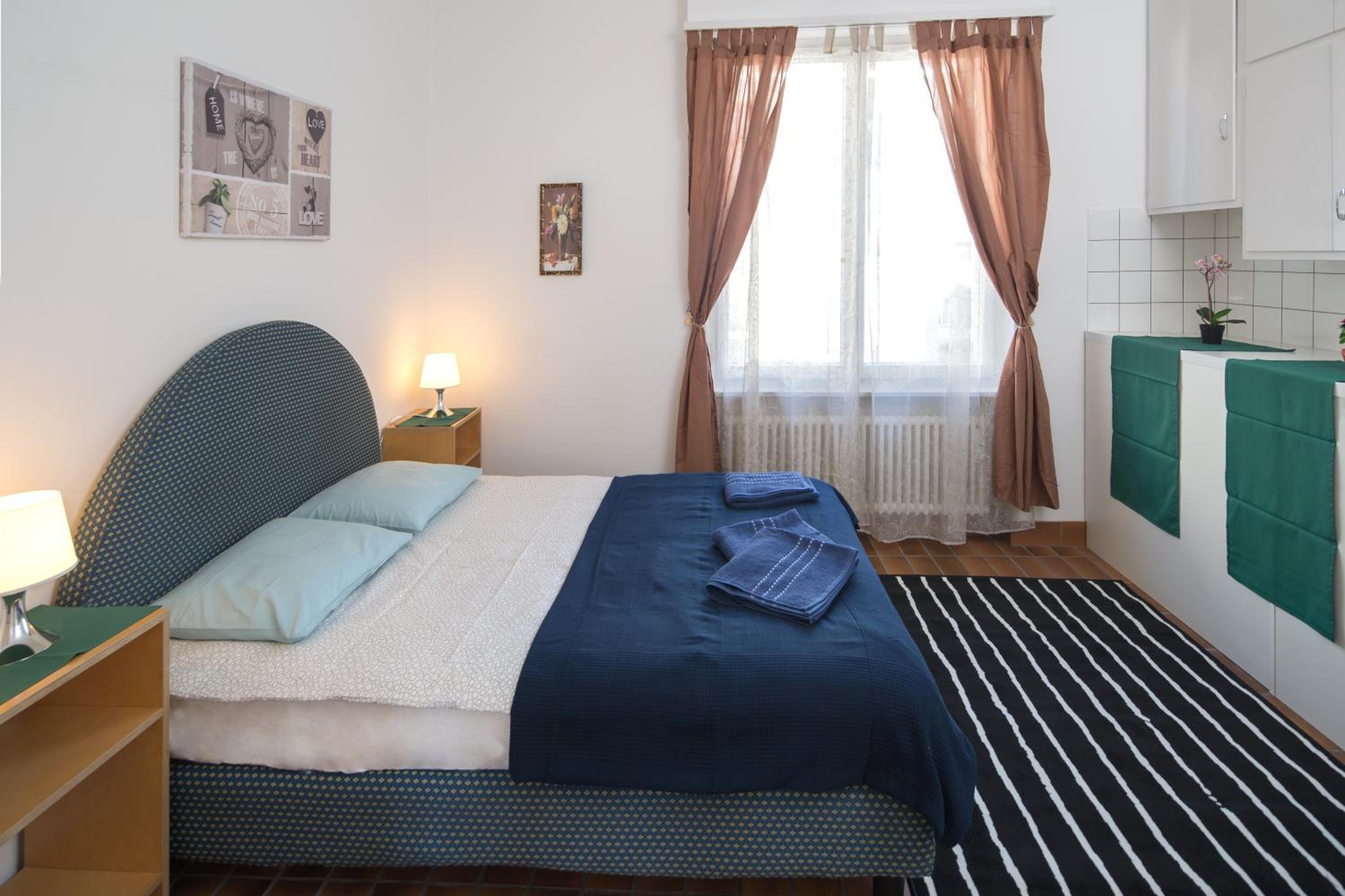 Queen Room with Shared Bathroom