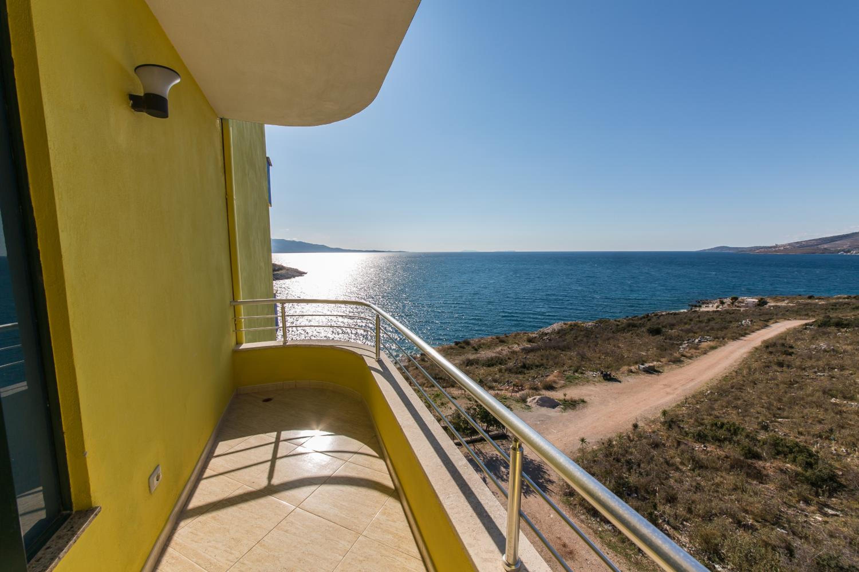 Panoramic Quadruple Room with Balcony and Side Sea View photo 3