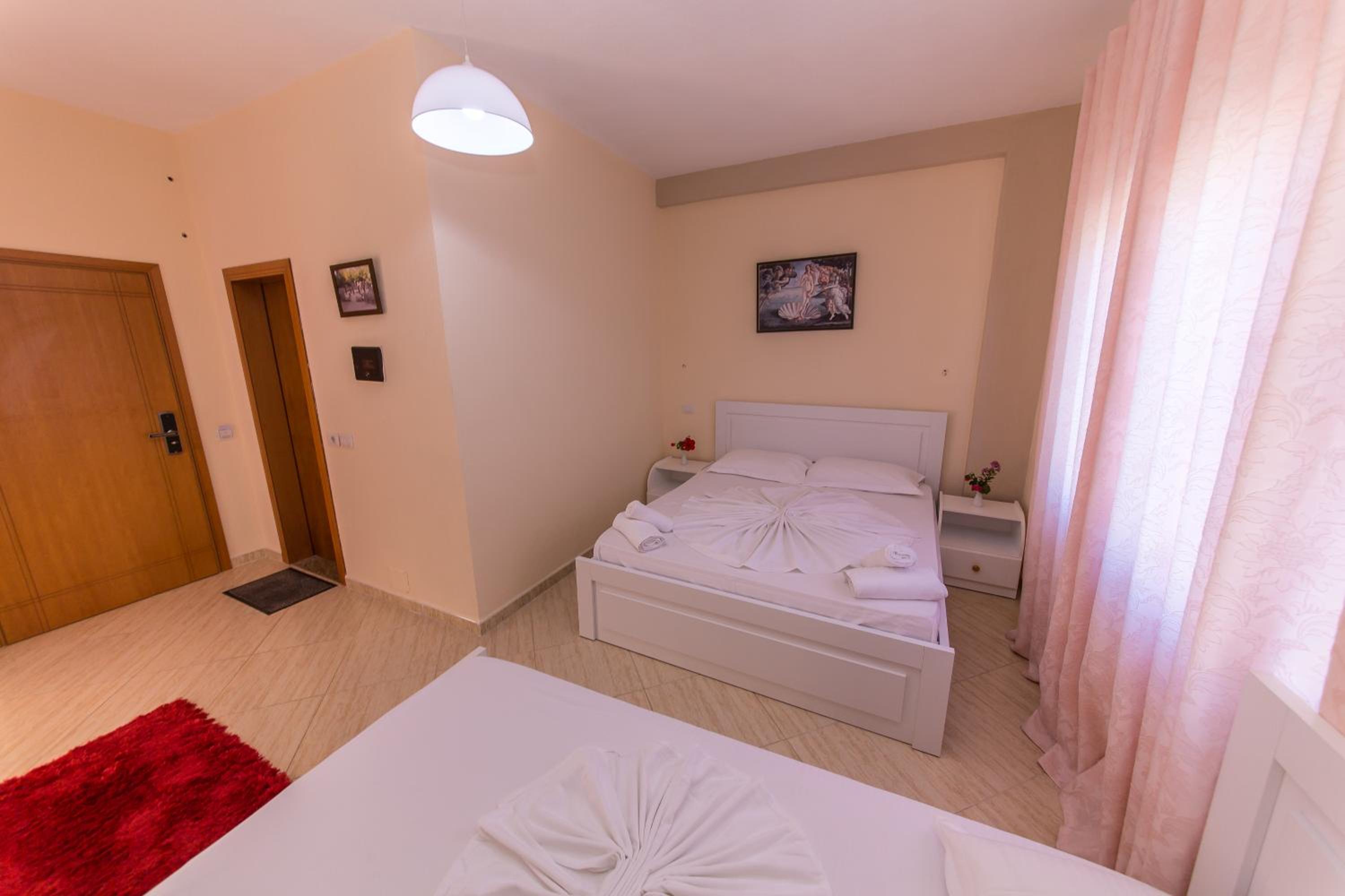 Quadruple Room with Balcony and Side Sea View photo 1