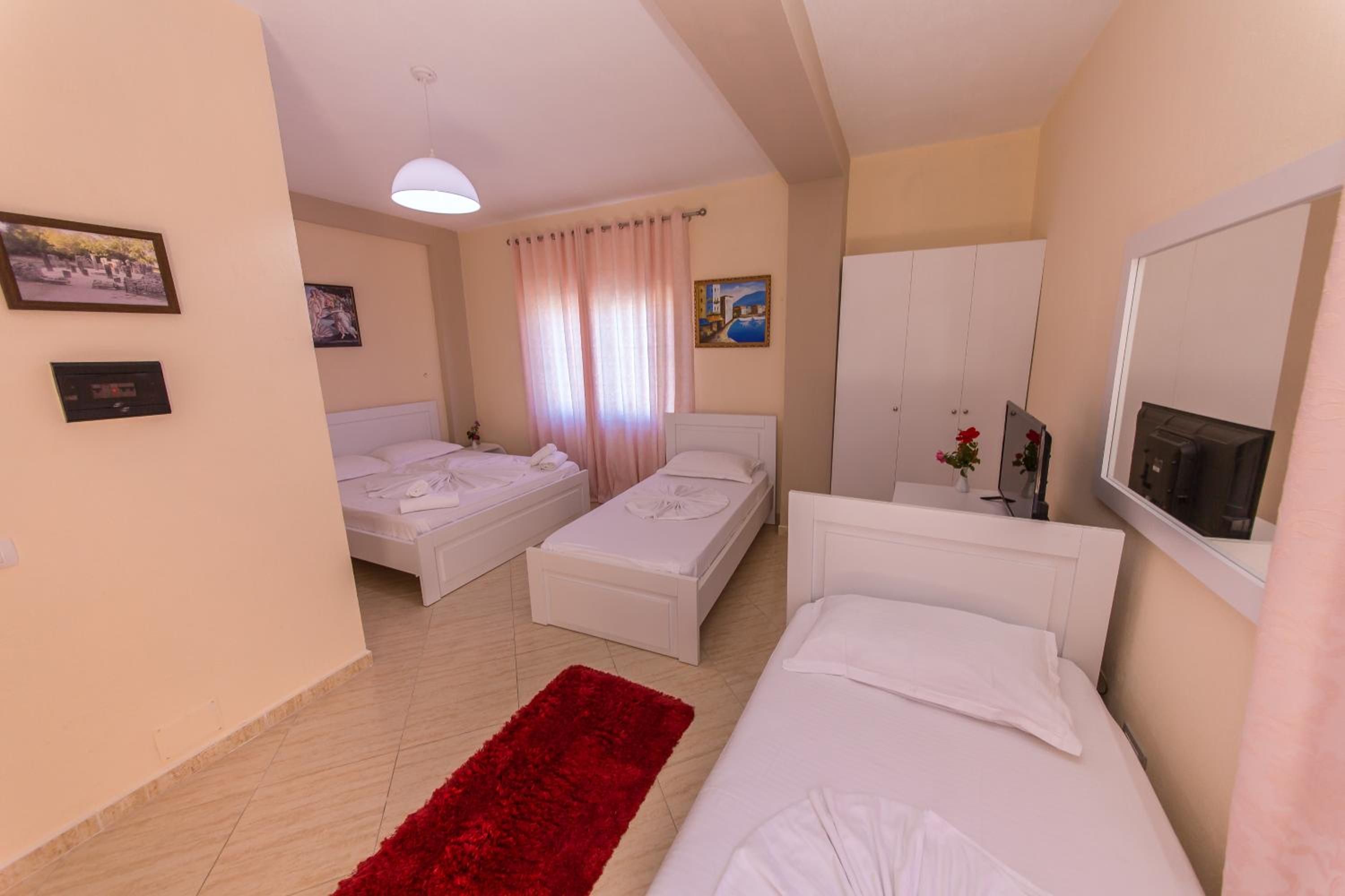 Panoramic Quadruple Room with Balcony and Side Sea View photo 2